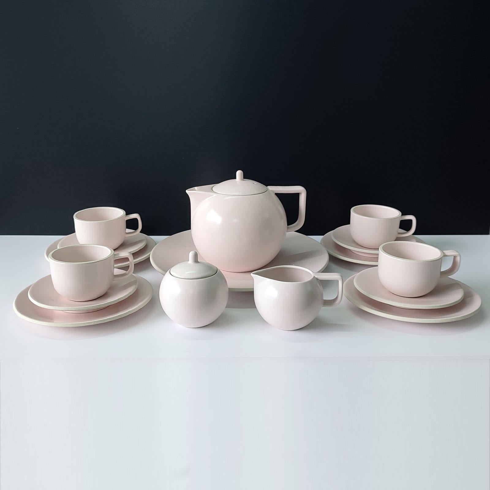 A 1980's Post Modern Sasaki Japan dinnerware set for 4, comprising 27 pieces. Design Massimo Vignelli, matte pink Colorstone ceramic.
This dinnerware is an incredibly special and unique set to add to your tabletop collection. Made in Japan in the