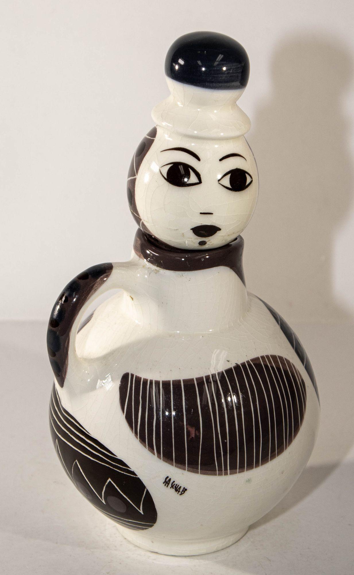 Sascha Brastoff Art Studio Ceramic midcentury Art Pottery Lady Pitcher, Circa 1950s.
Mid-Century Modern Sascha Bradstoff Ceramic Lady Pitcher or Ewer.
Sascha Brastoff unusual black and white ceramic pitcher of a lady whose head is the
