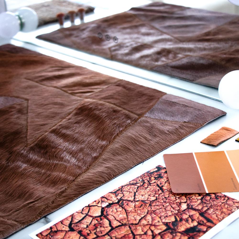 Sasha Bikoff's Fragments Rug transforms vintage leather patchwork inspiration into luxurious floor art. The rich Pink Clay palette—earthy, warm terracotta hues that evoke sun-baked desert landscapes—brings grounding warmth to any space.

Art Hide's