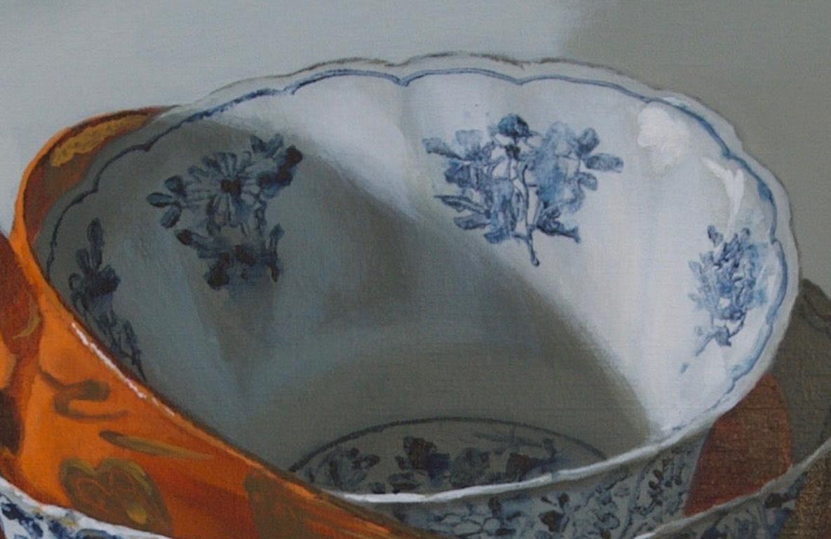 ''Stacking Orange and Blue'', Dutch Contemporary Still Life with Porcelain  - White Still-Life Painting by Sasja Wagenaar