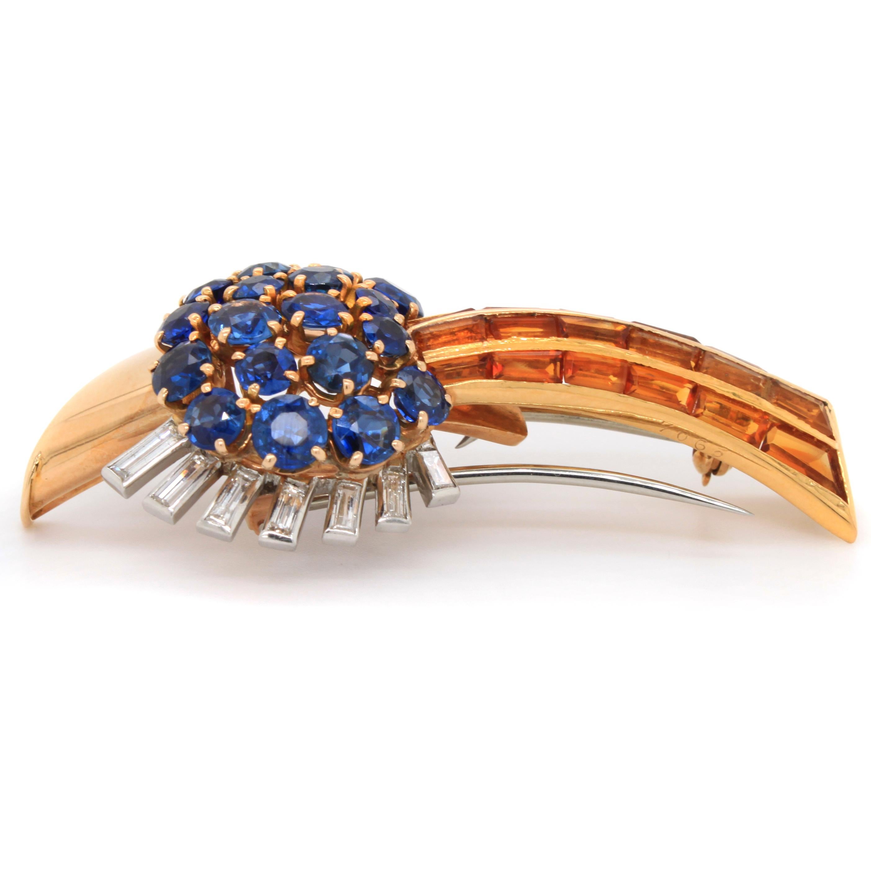 Beautiful Retro Sapphire Citrine Diamond Comet Clip Brooch, ca. 1940s by Sasportas

The retro comet brooch consists of a cluster of round cut sapphires of ca. 3 carats and channel set citrines, further accentuated by baguette cut diamonds.

The