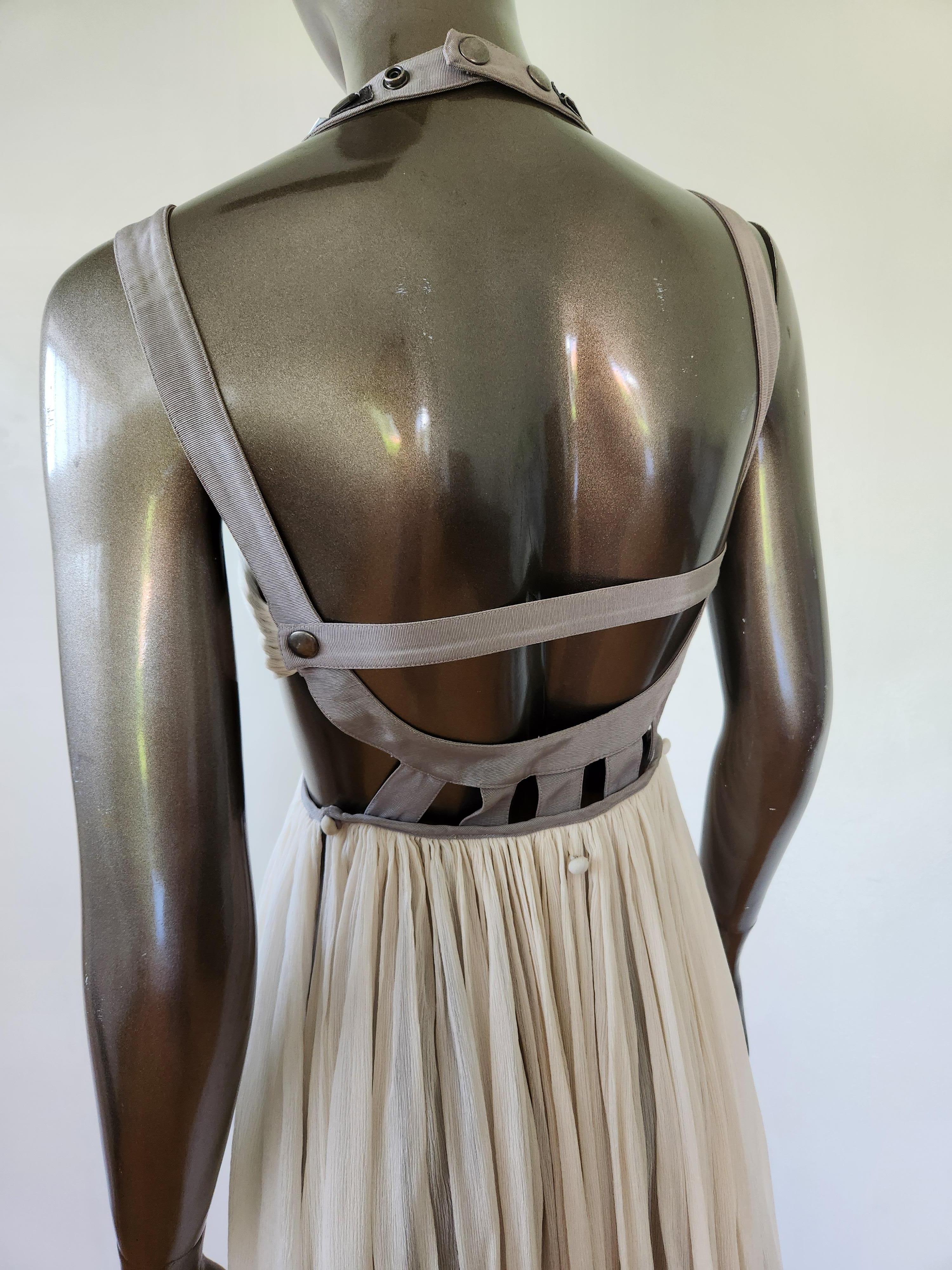 Dress made famous by Paris Hilton in the 2000s
Crepe
Embellished
Contrasting trims
Silk
The hem can be adjusted, can be worn as maxi dress, or button up as short dress.