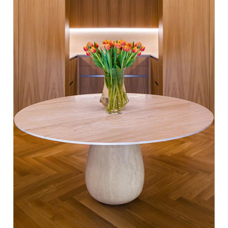 a Monolithic Masterpiece of Elegance & Pure Design

Behold the awe-inspiring presence of the SASSO DINING TABLE, a monolithic marvel that showcases the beauty of craftsmanship and the essence of clear design. With its commanding stature and bold