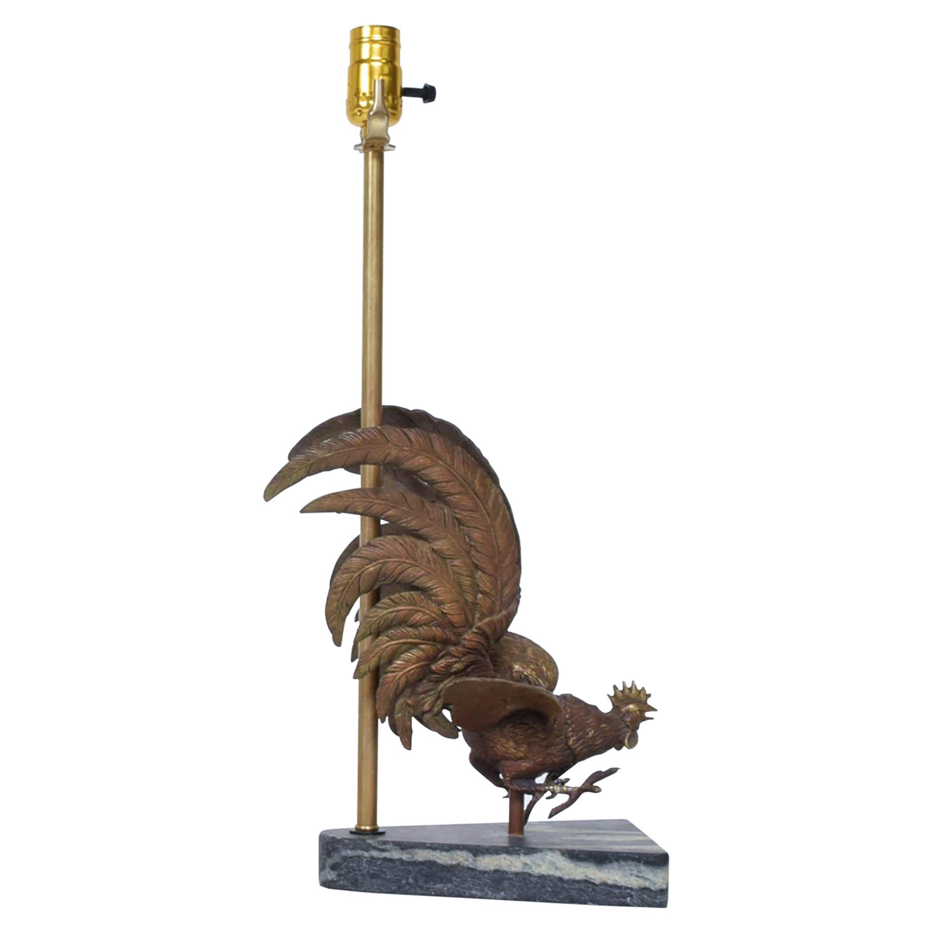 Table Lamp
Hollywood Regency Sassy Rooster in Bronze
Sculptural Table Lamp Midcentury Modern 1960s
Mounted on Green Marble base.
Unmarked. In the style of Maison Charles.
Dimensions:
20 1/2