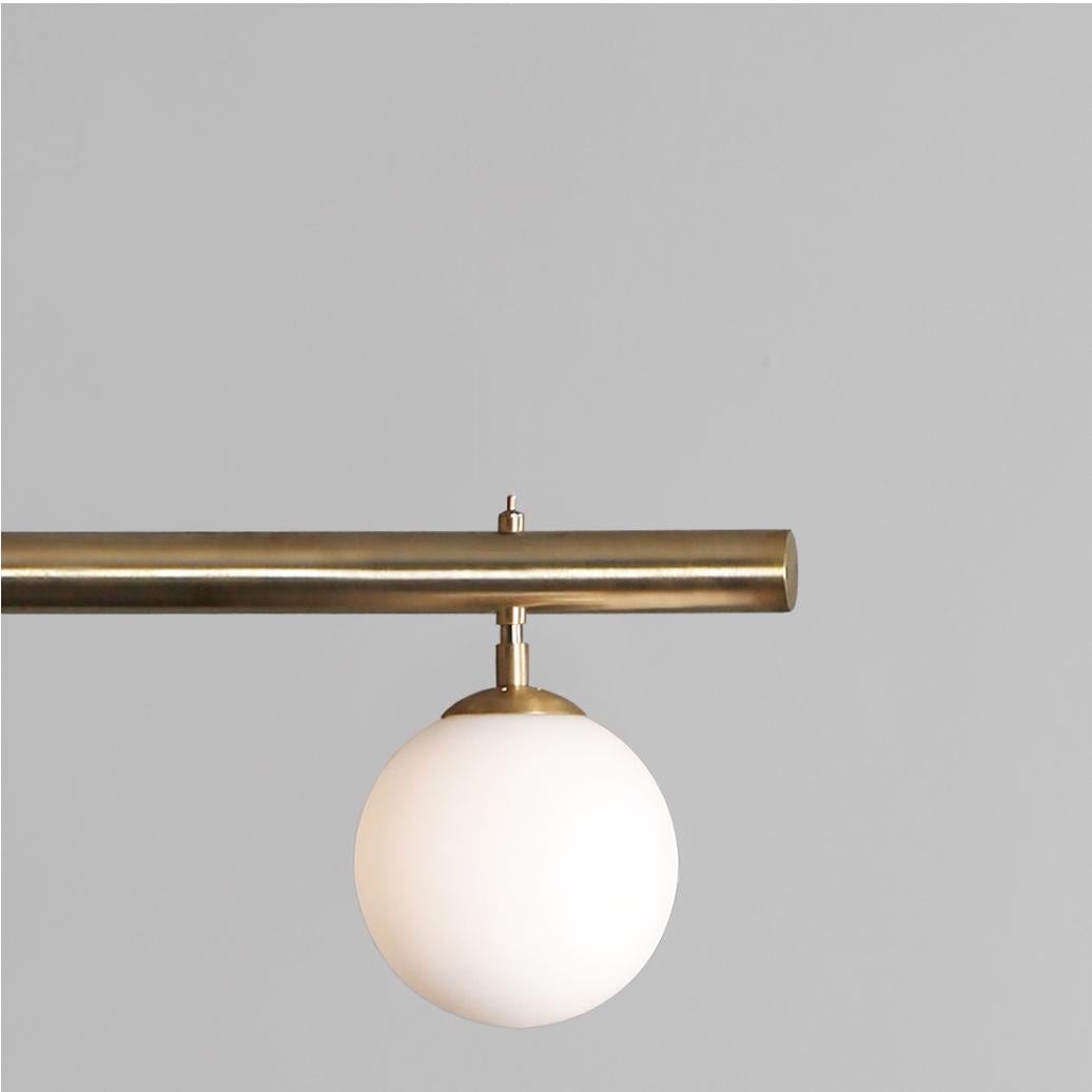 Satellite II, sculpted pendant by Paul Matter
Satellite II
Brushed brass with brushed brass details.
Also available in blackened brass with brushed brass details.
Dimensions: H 72
