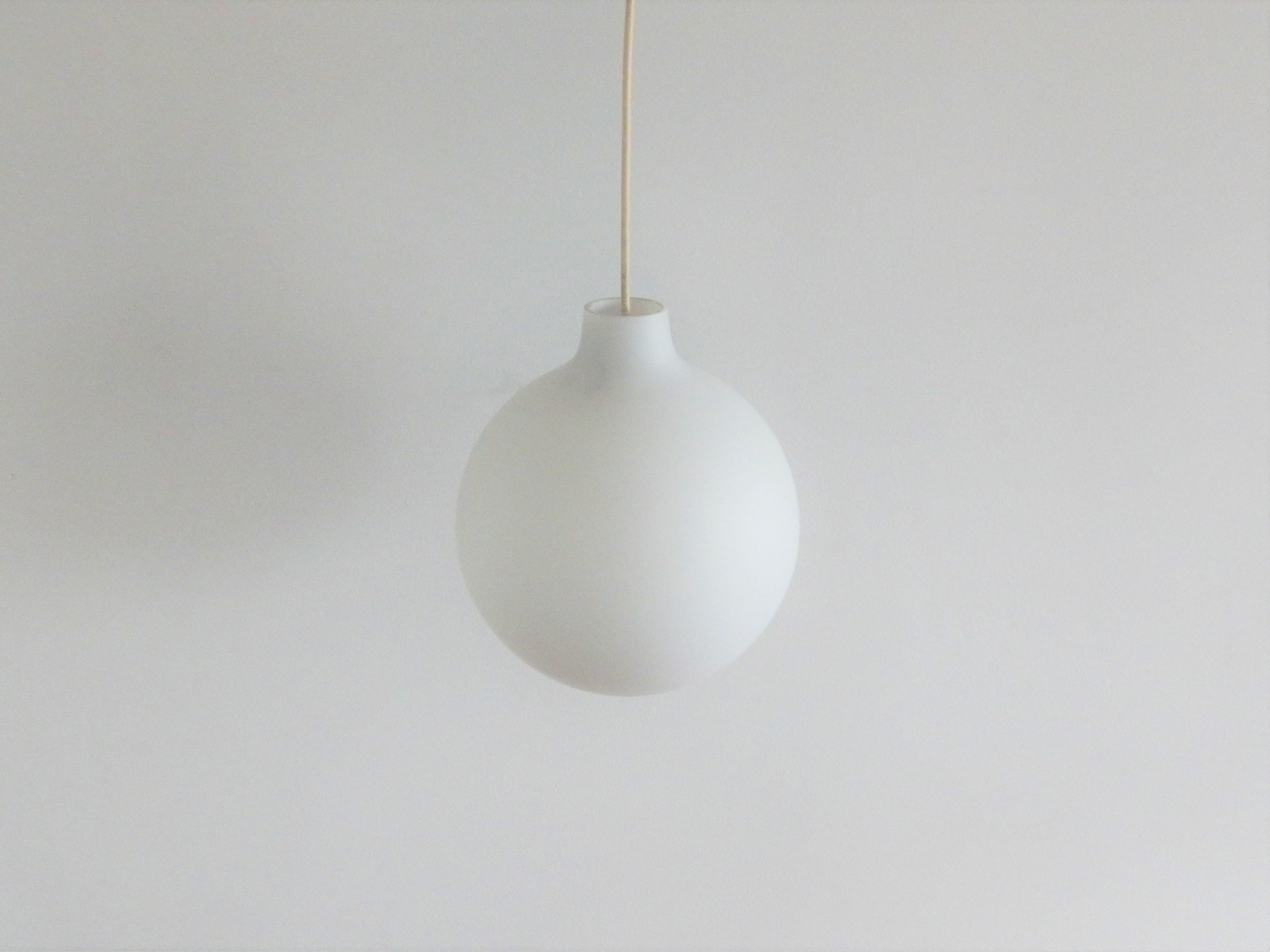 The Classic 'Satellite' pendant lamp was designed by Vilhelm Wohlert for Louis Poulsen in the 1950s in Denmark. Vilhelm Wohlert was asked to design a pendant lamp in three different sizes to make it suitable for spaces of varying sizes. In addition,