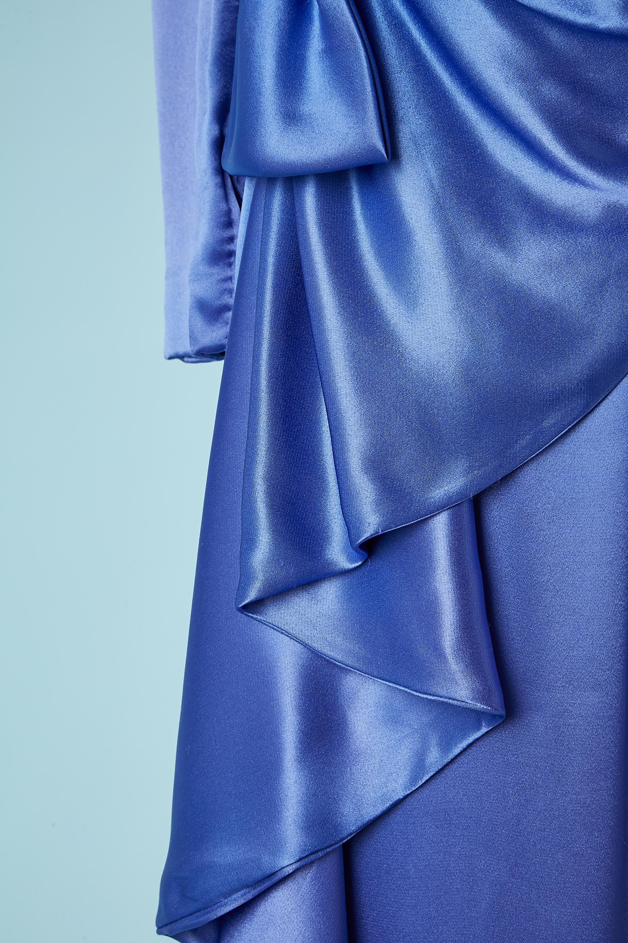 Blue silk satin asymmetrical draped cocktail dress with bow. Ruffles on the side of the skirt. Zip on the cuff. Zip on the right side + snaps+ hook&eye 
SIZE S