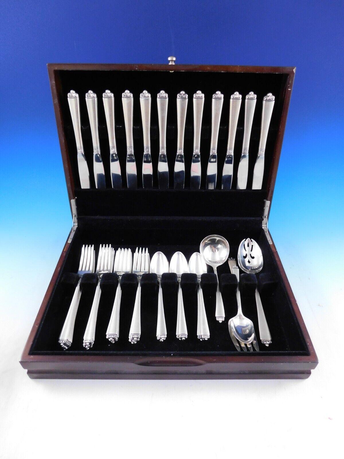 Satin Beauty by Oneida sterling silver Flatware set with satin finish, 52 pieces. This set includes:

12 Knives, 8 7/8