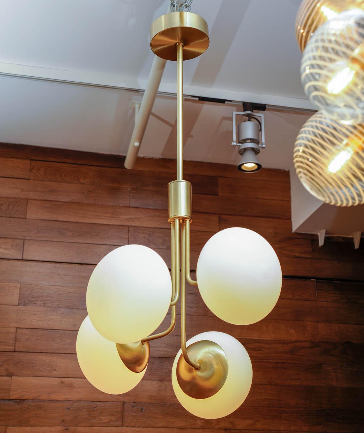 Modern Satin Brass Suspension with Four Lights and Round White Glass Globe