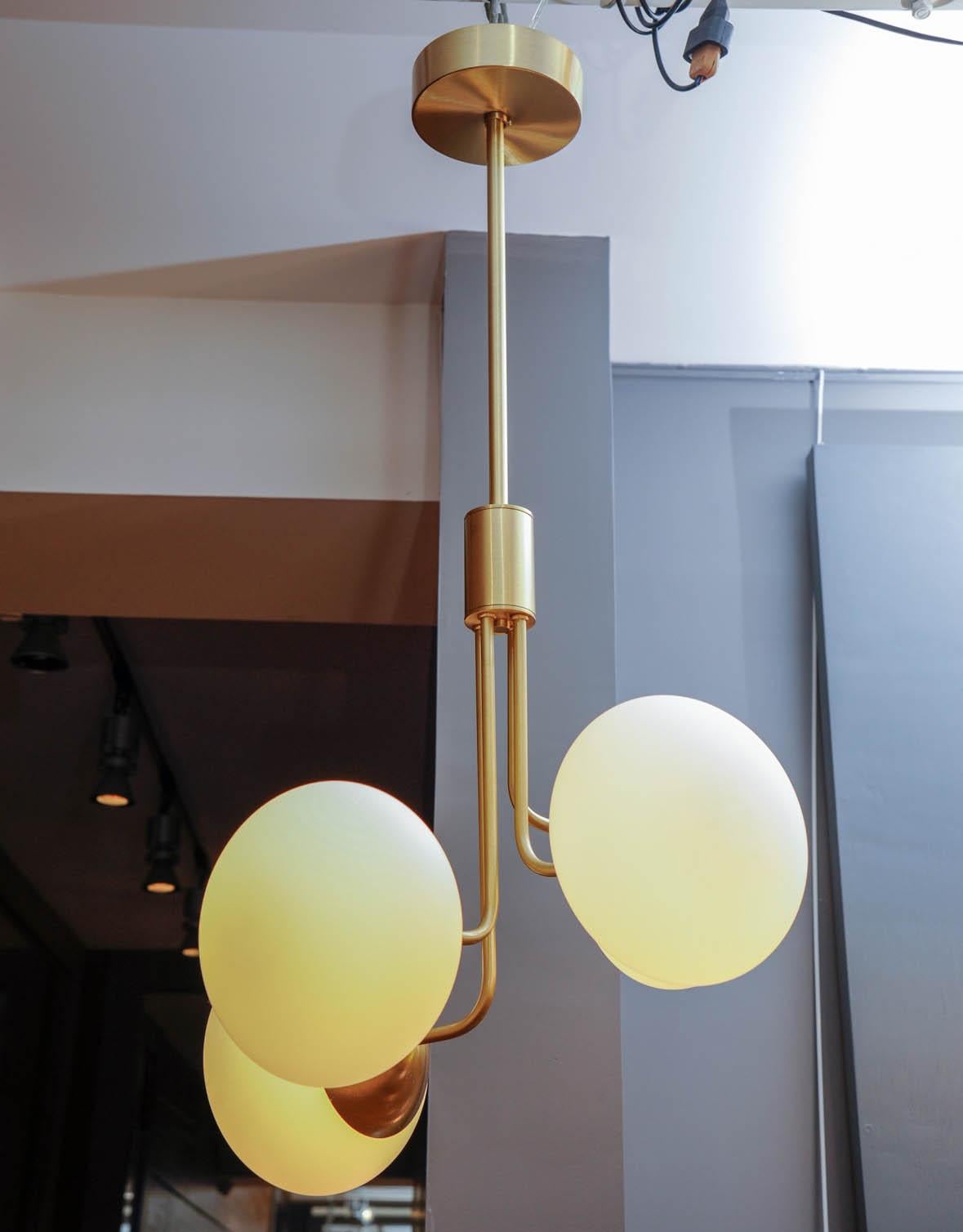 Italian Satin Brass Suspension with Four Lights and Round White Glass Globe