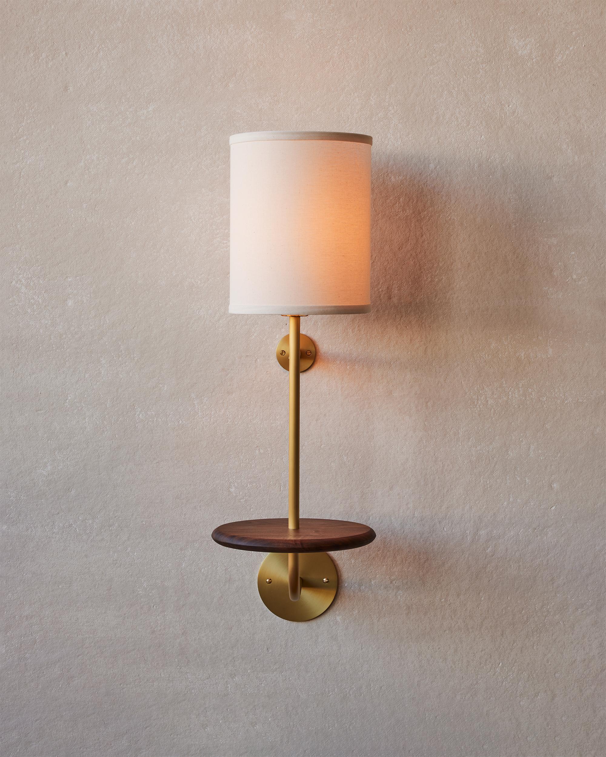 American Satin Brass Wall Sconce with Black Walnut Shelf Hardwired Ivory Linen Shade For Sale