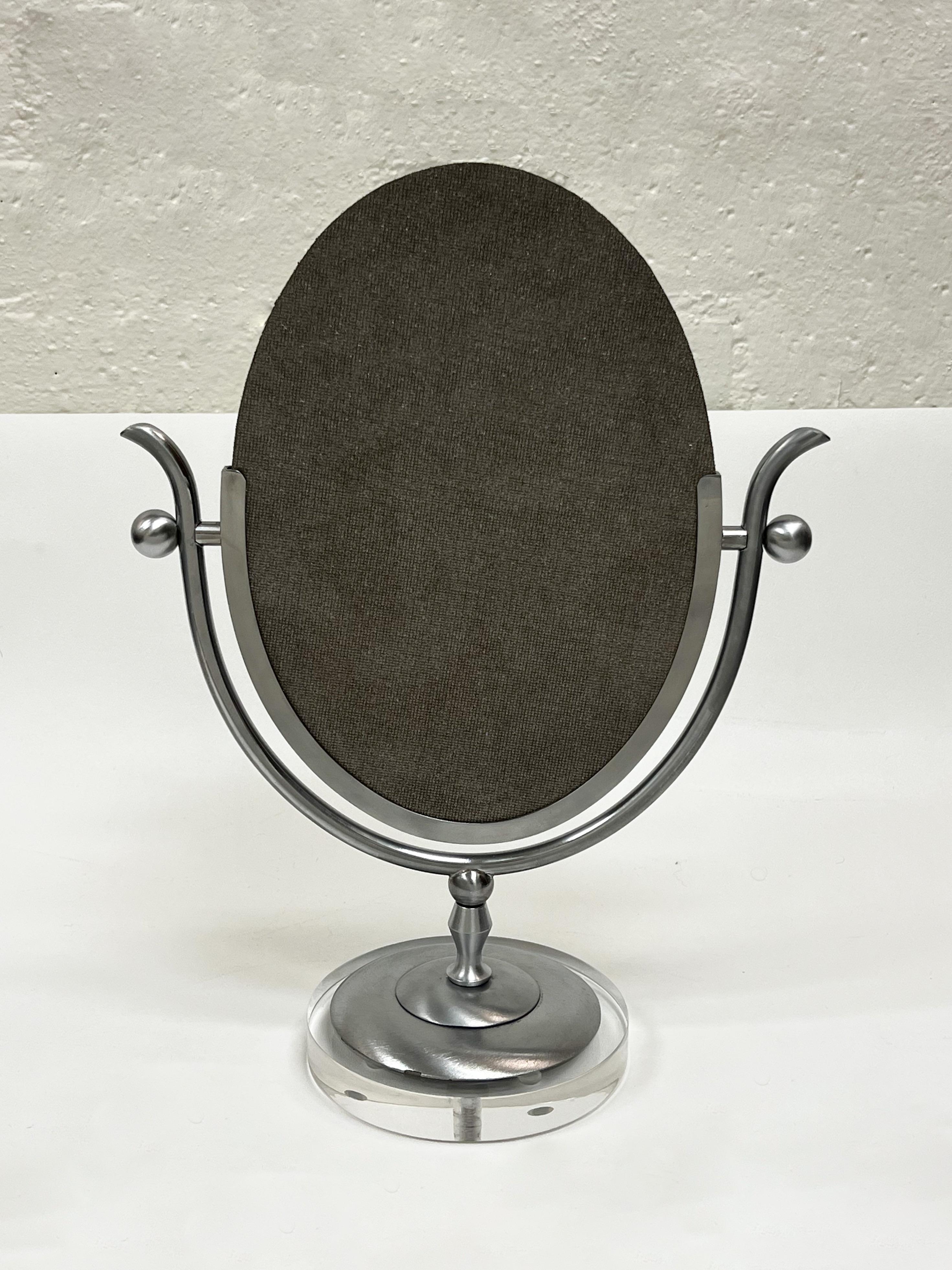 Glamorous 1970’s “Wishbone” vanity mirror by renowned American designer to the stars Charles Hollis Jones. 
The lucite was newly professionally polished and mirror was replaced. 

Measurements: 19” High 14” Wide 7” Deep. 
Base is 7” Diameter. 

