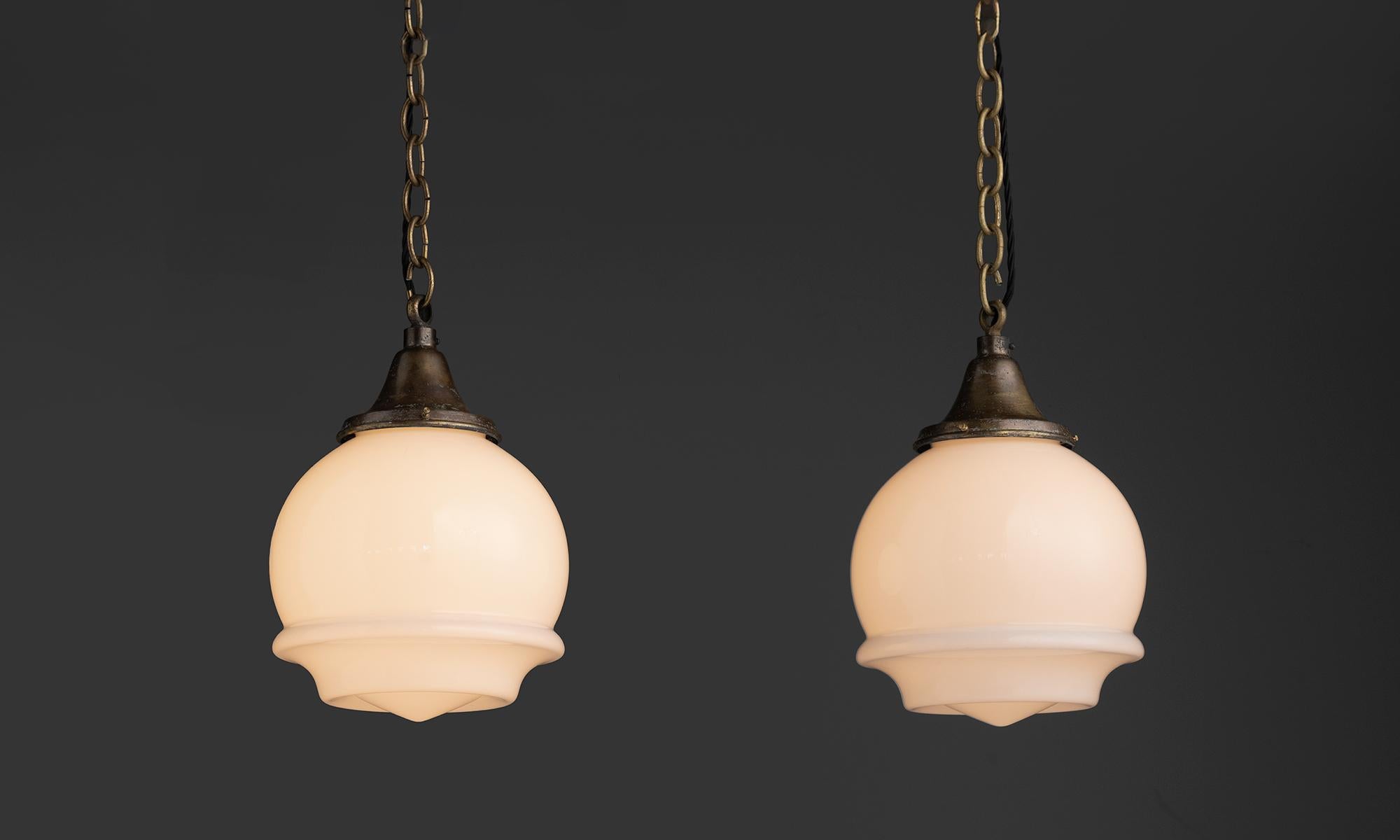 Netherlands, 1920
Opaline glass shades with brass canopies, produced by Robli.
9.5”dia x 14”h
Ref. L5169
$ 1,800