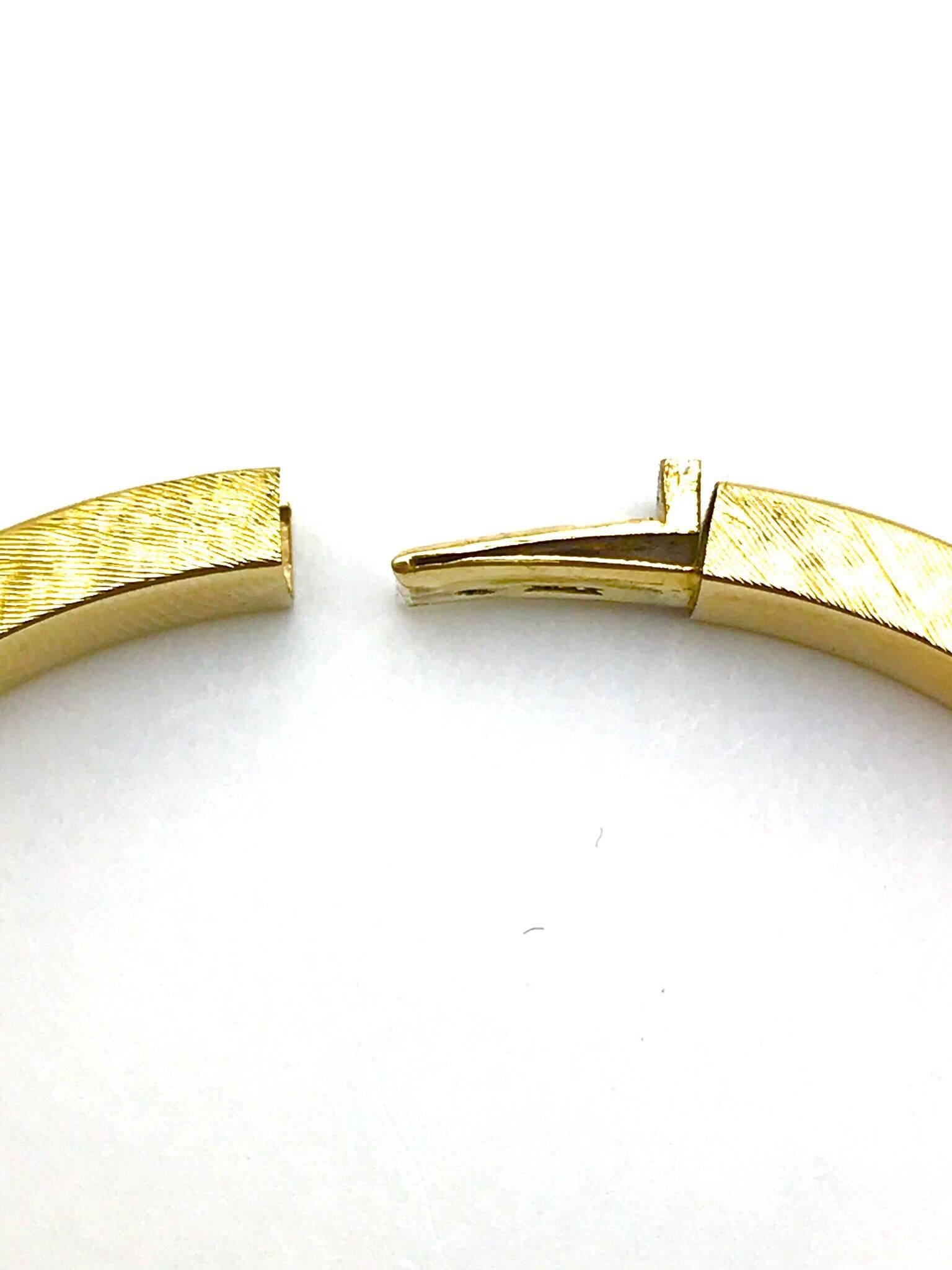 Retro Satin Finish 14 Karat Yellow Gold Bangle Bracelet with a Hidden Clasp