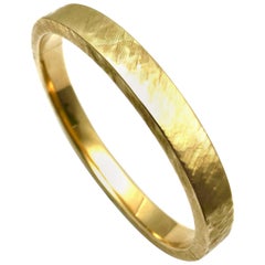 Satin Finish 14 Karat Yellow Gold Bangle Bracelet with a Hidden Clasp