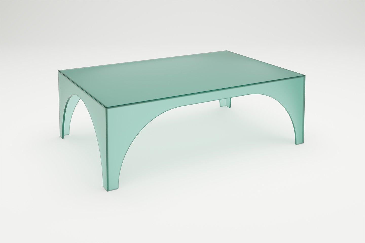Satin Glass Blue Arc Oblong coffee table by Sebastian Scherer.
Material: satin glass.
Also available in glass, clear glass, marble.
Dimensions: 105 x 70 x 35 cm
Colour: blue
Also available in bronze, black, green, white. 

The Arc series is