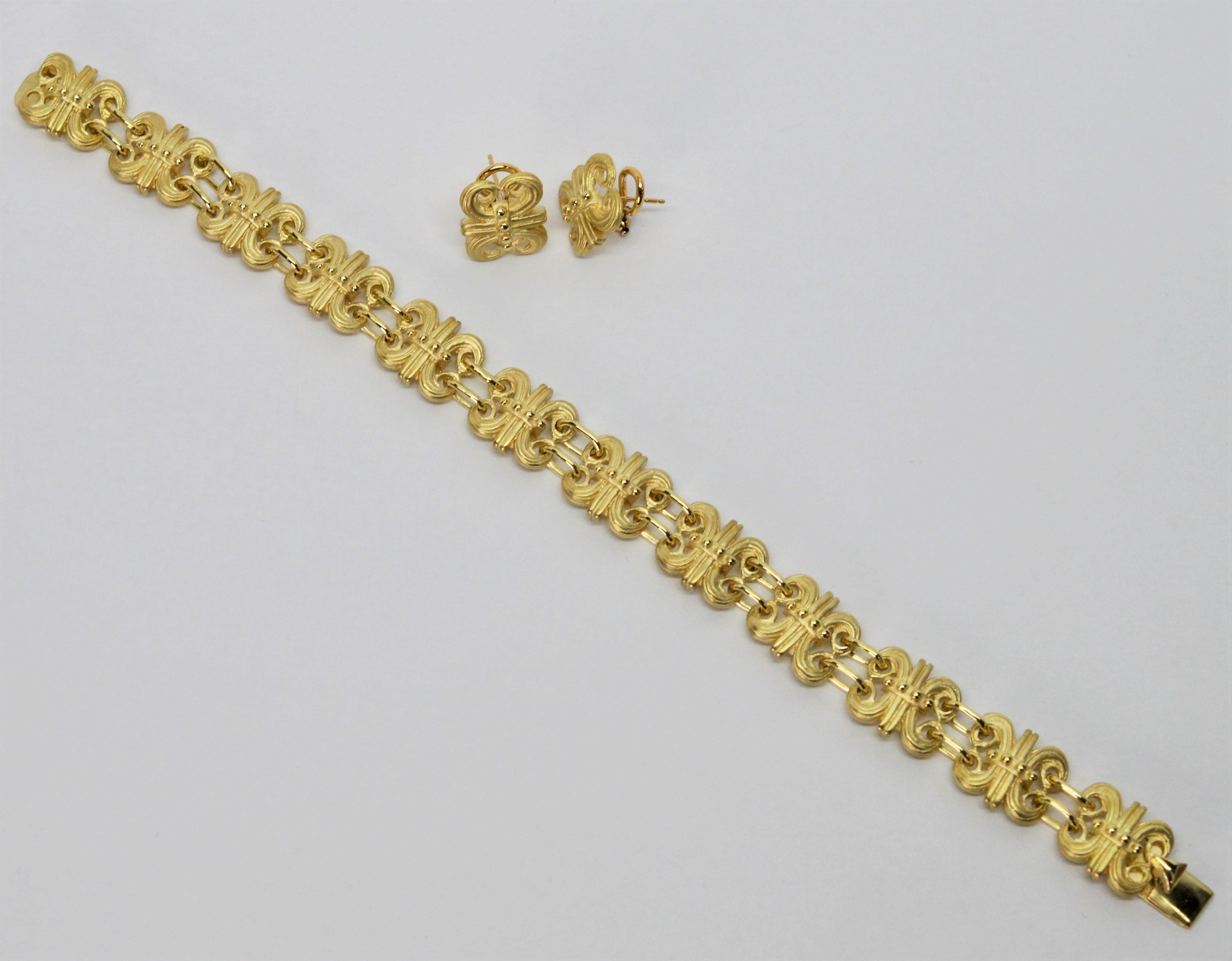 Women's Satin 14 Karat Gold Fleur-de-Lis Bracelet and Earring Set For Sale