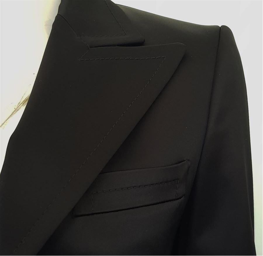 Satin Black color Three pockets Single button closure Length shoulder/hem cm 52 (20.5 inches) Shoulders length cm 38 (14.9 inches)
