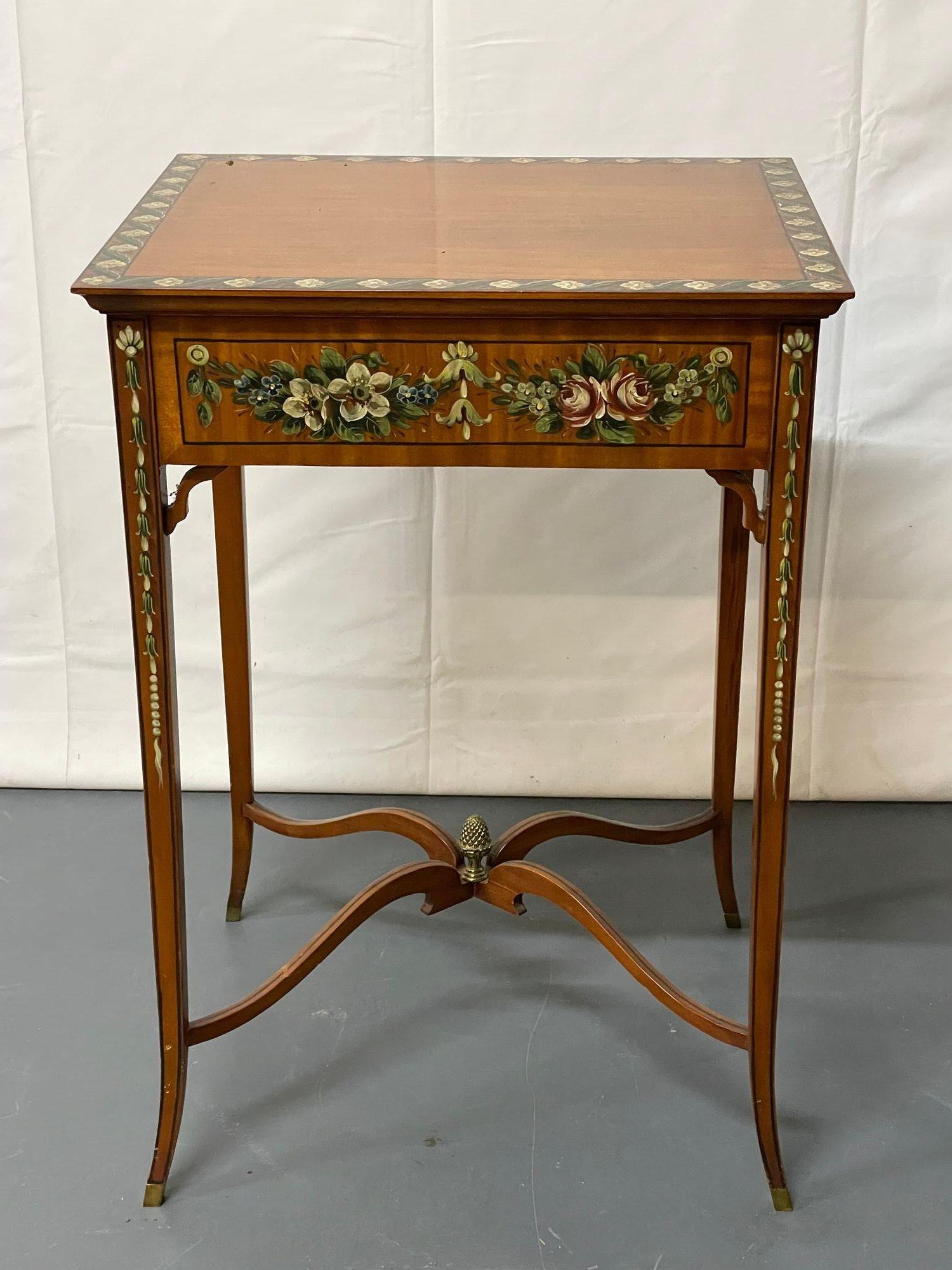 Satinwood Adams style inlaid end / side / bedside table, Maitland Smith.
 
A finely hand-painted, satinwood single drawer end table bearing the Maitland Smith label. Beautiful green leaves and rosettes adorn the top and sides and a handsome bronze