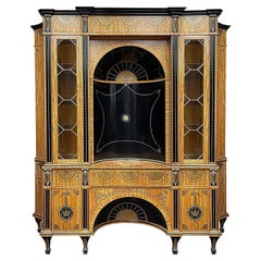 Antique Satinwood bookcase in the style of Thomas Chippendale.
