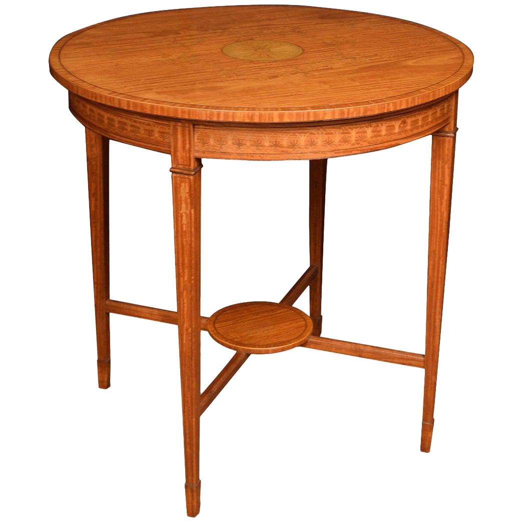 Table centrale incrustée en bois de satin