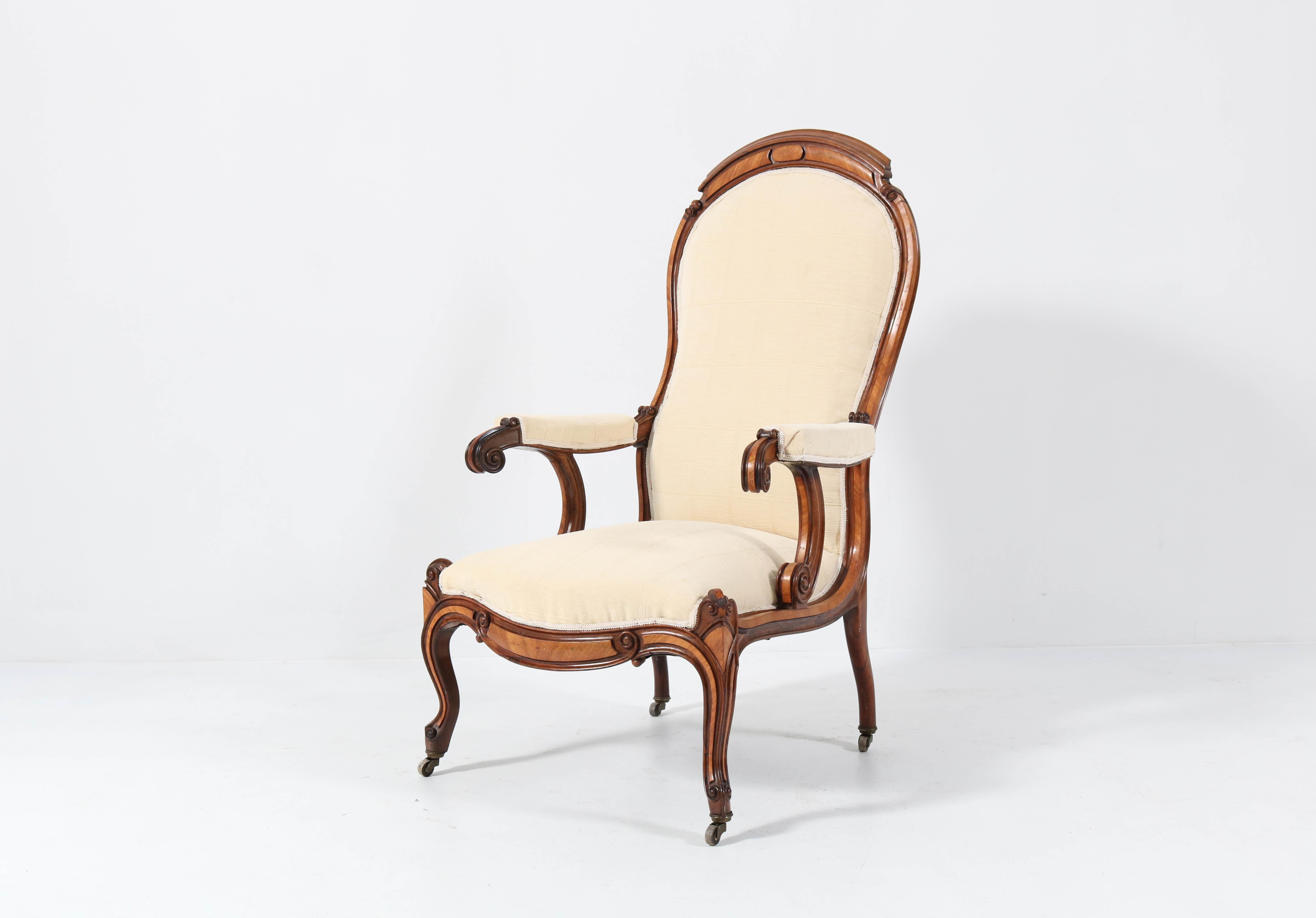 Magnificent and rare Victorian high back armchair or Voltaire chair.
Striking Dutch design from the 1860s.
This wonderful piece of furniture is rare because of its design especially on the side of the chair.
Satinwood frame and re-upholstered