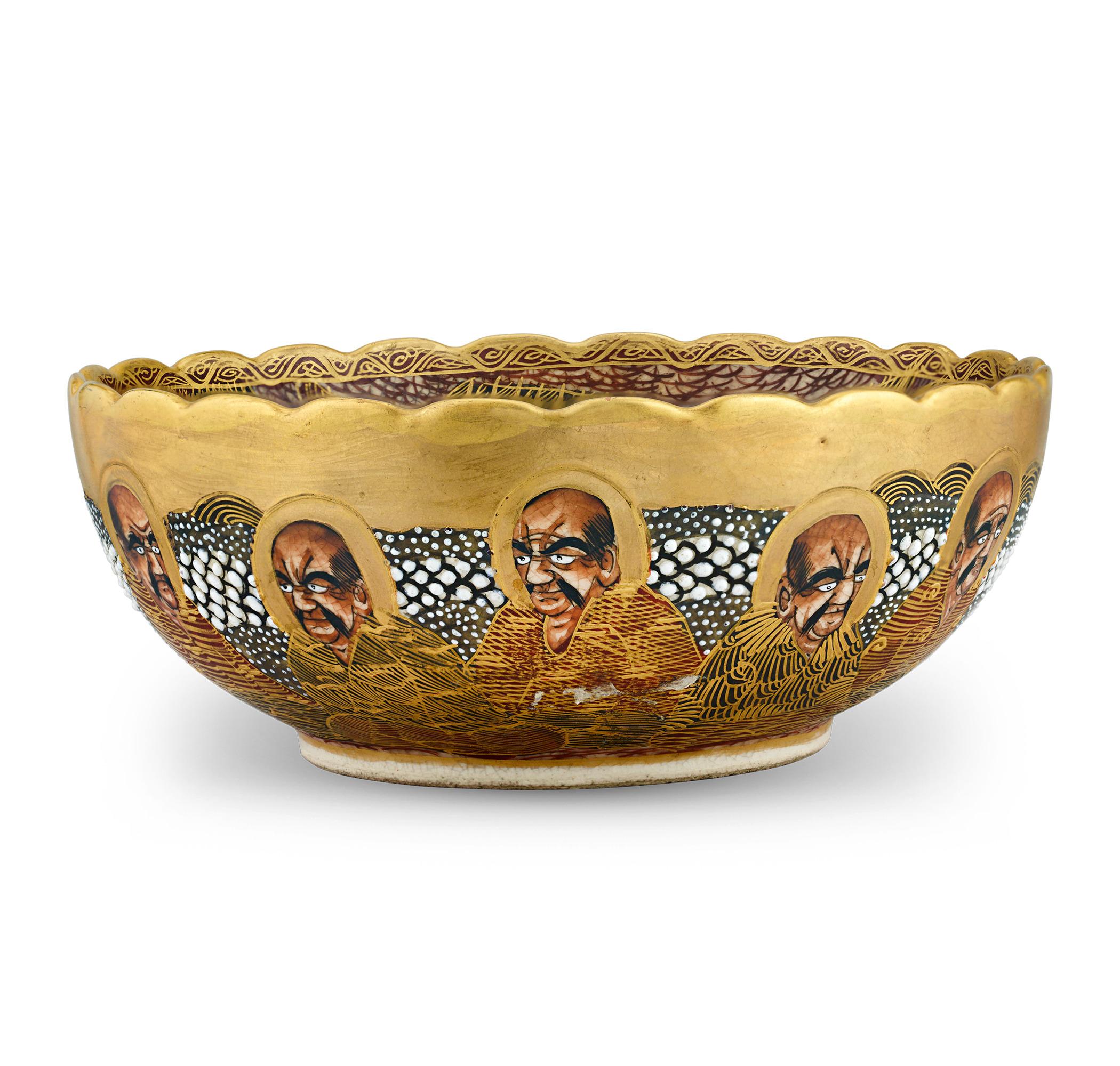 This highly detailed Satsuma bowl is adorned with Buddhist monks and signed “Hododa” on the underside. The columns on the underside read, “Satsuma” and “Hododa.” This represents the highly collectible and prominent maker of Satsuma ware. The pattern