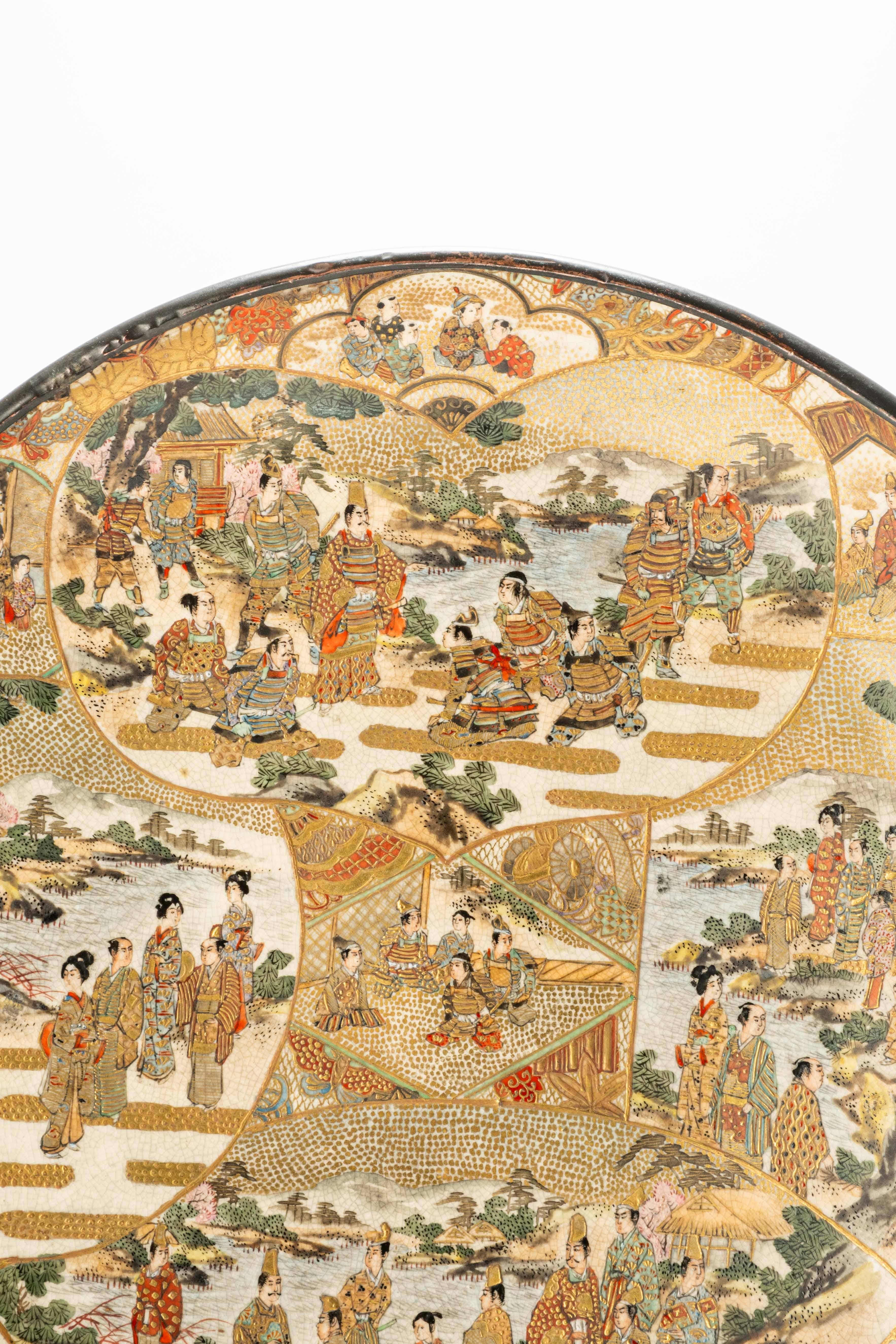 Japanese Satsuma ceramic plate adorned with polychrome and gold decorations For Sale