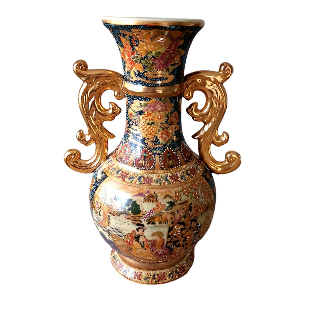 Satsuma Earthenware Gold Gilded Hand Painted Double Handle Vase

Tags Marks Hallmarks: Satsuma
Pattern: Gold Gilded
Material: Earthenware
Type or Style: Vase
Crafted In: China
Circa: 1900s
Item Height: 15 in
Condition Notes: Excellent, no chips or