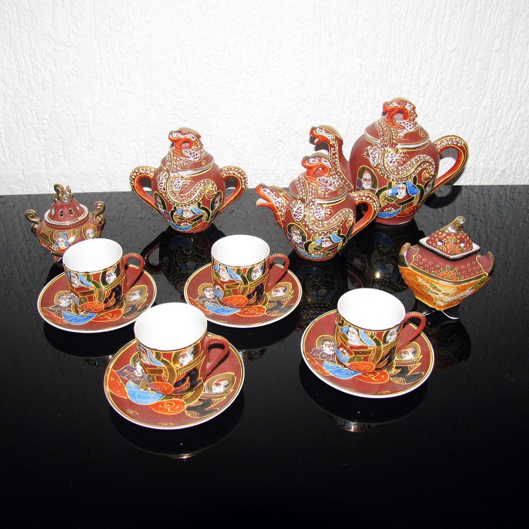 Delicate vintage Satsuma Dragon tea set Moriage Lithophane Geisha eggshell fine porcelain, each cup has a Geisha girl lithophane on the bottom. The lids are decorated with Dragon Knobs. Hand painted in brown with white dots - so called moriage,