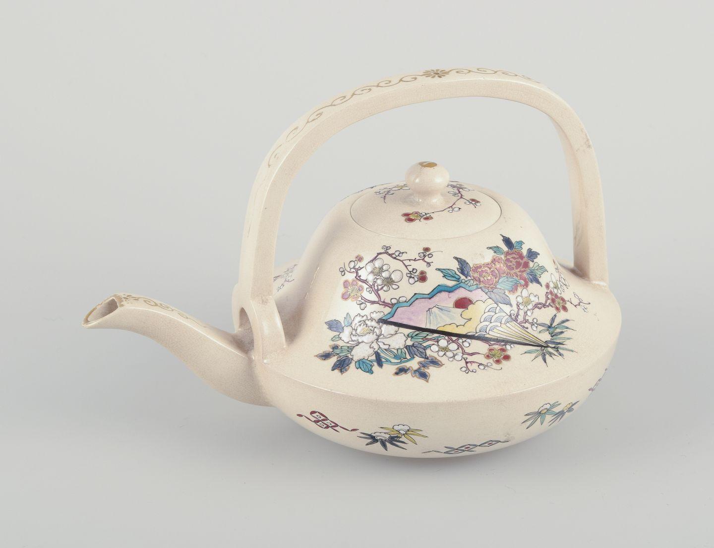 Pre-owned goods are exempt from import duties for U.S. customers. 
Therefore, no import tariffs will be applicable to your purchase.

Satsuma, Imperial Japan.
Miniature teapot in earthenware. 
Hand-painted with floral motifs and fan.
Unmarked.
In