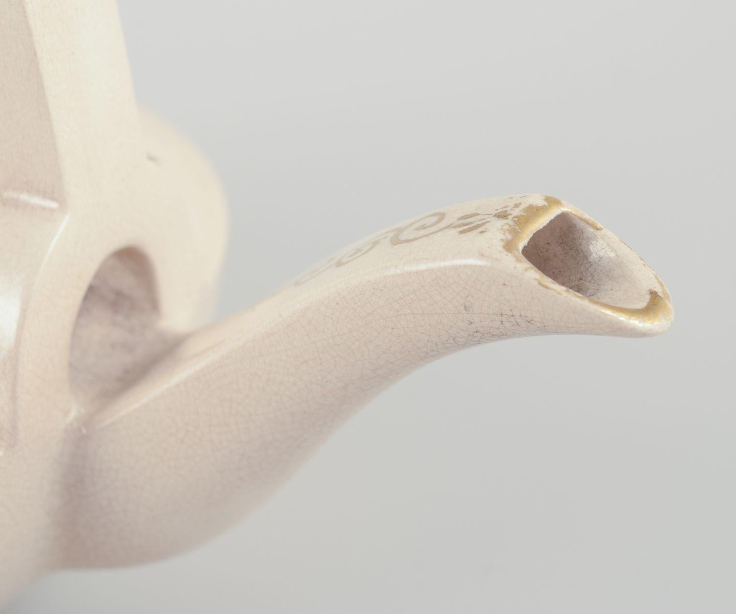 Late 19th Century Satsuma, Imperial Japan. Miniature teapot in earthenware. Approx. 1870s For Sale