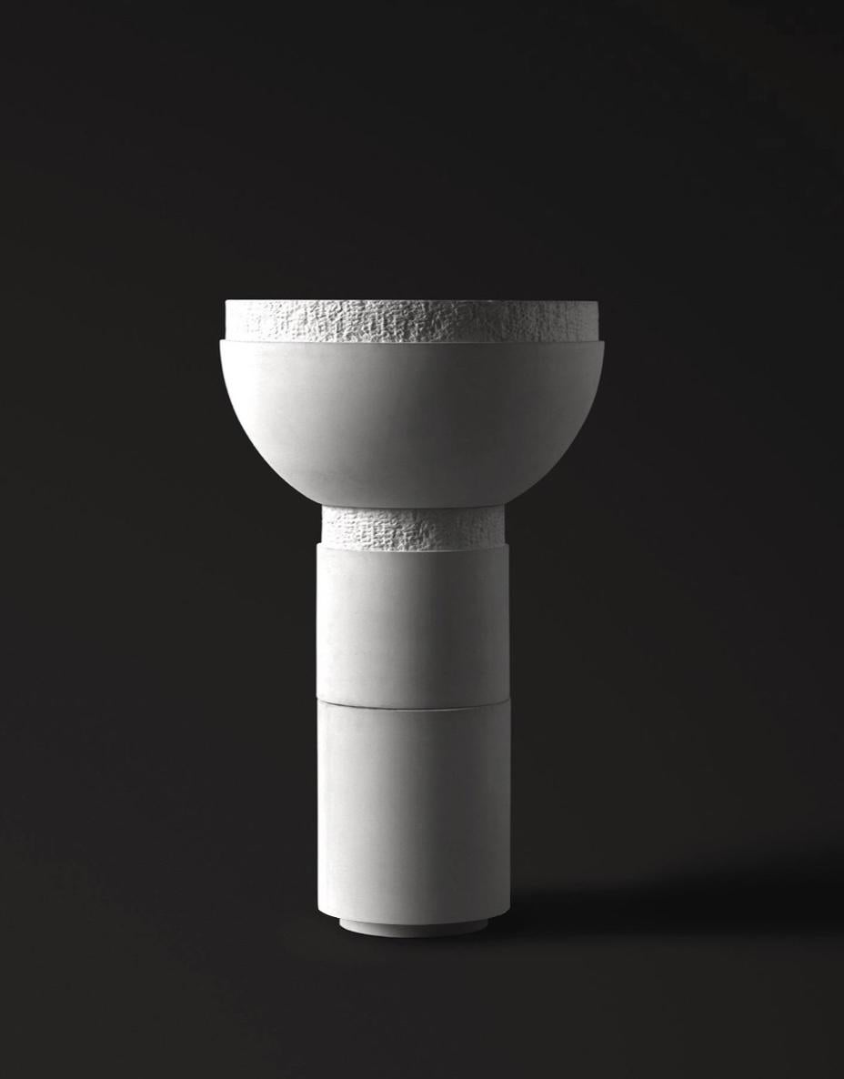 SATURN III by Sirak. 
Footed Bowl Planter in Cast Concrete

The footed bowl planter is cast in super refined concrete that recalls dry porcelain. The planter is suitable for both interior and exterior settings and can be produced with or without a