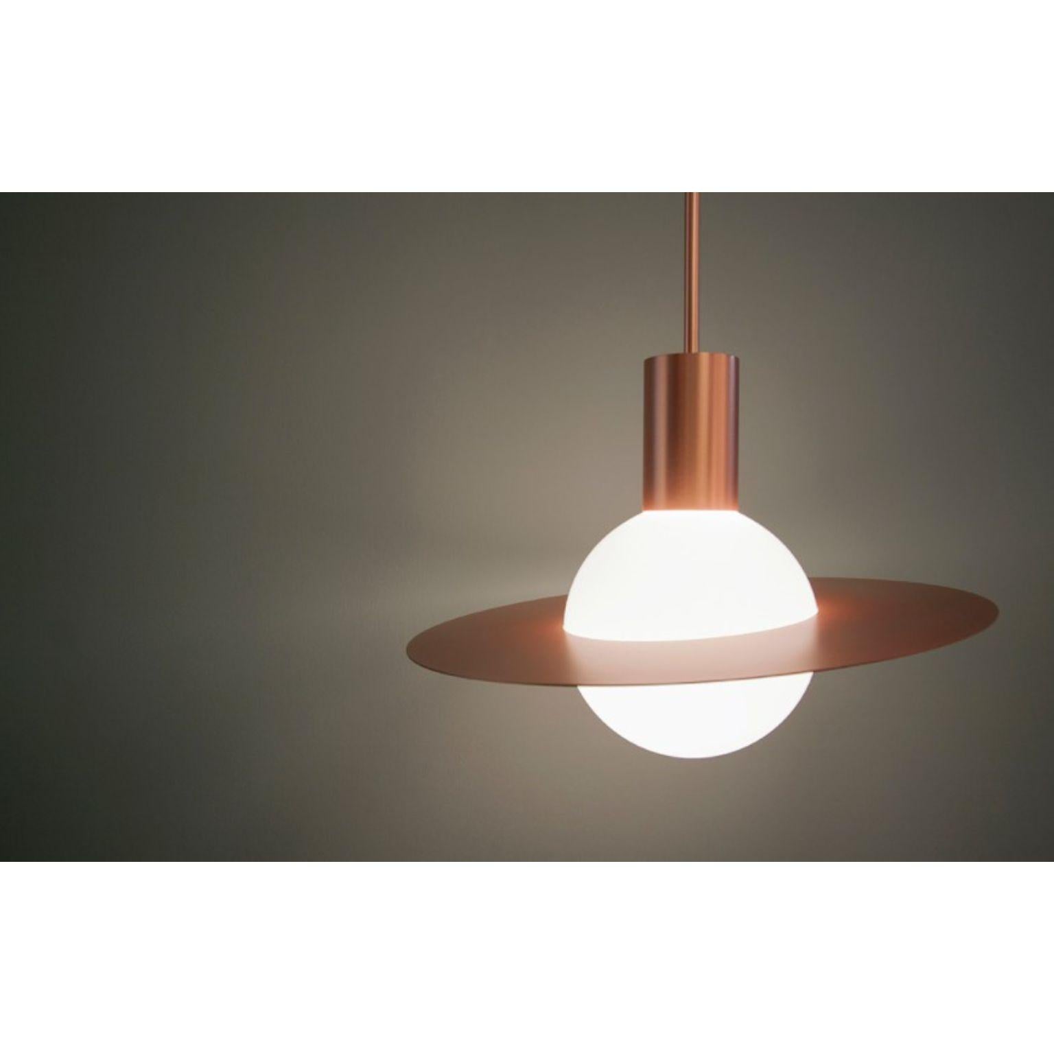 Saturne Pendant by Hervé Langlais
Dimensions: D45x H220.3 cm
Materials: Solid brass, Opal mouth-blown glass, Textile cable.
Others finishes and dimensions are available.

All our lamps can be wired according to each country. If sold to the USA
