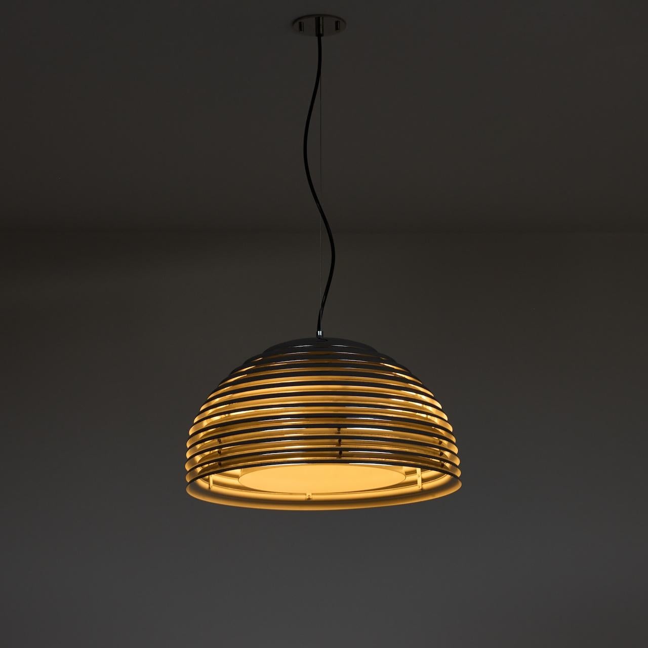 'Saturno' Ceiling Light by Kazuo Motozawa for Staff Leuchten (Germany, 1960s)

Half dome shell comprising of thin chrome beveled banding, allowing for a gorgeous diffusion of light through the entire body. The interior is finished in a white enamel.