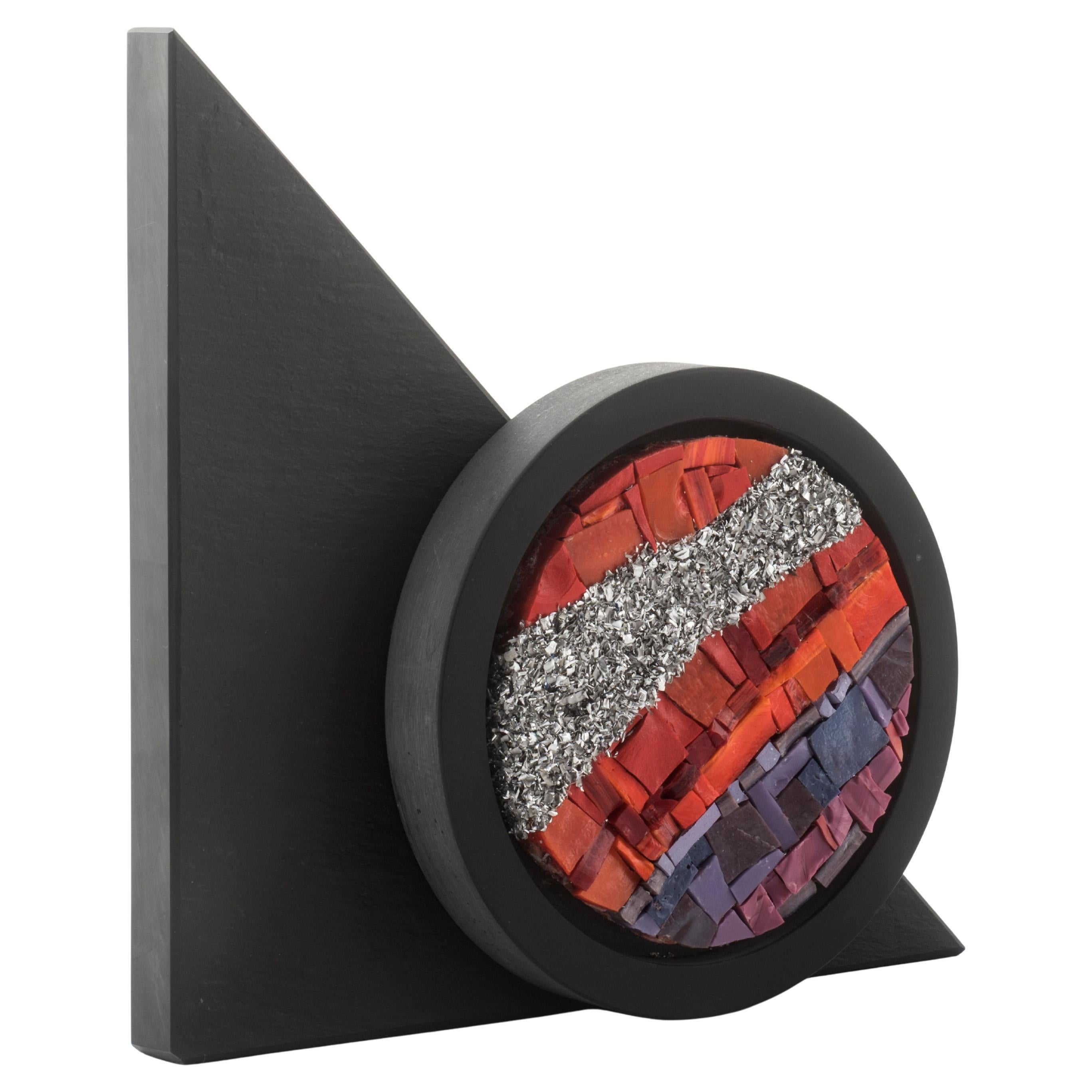 SATURNUS  is a table sculpture  unique, signed by Italian artist Nino Basso, part of the I MOSAICI collection.  A work that blends  geometric minimalism and traditional craftsmanship, reinterpreting  the ancient art of venetian mosaic  in a