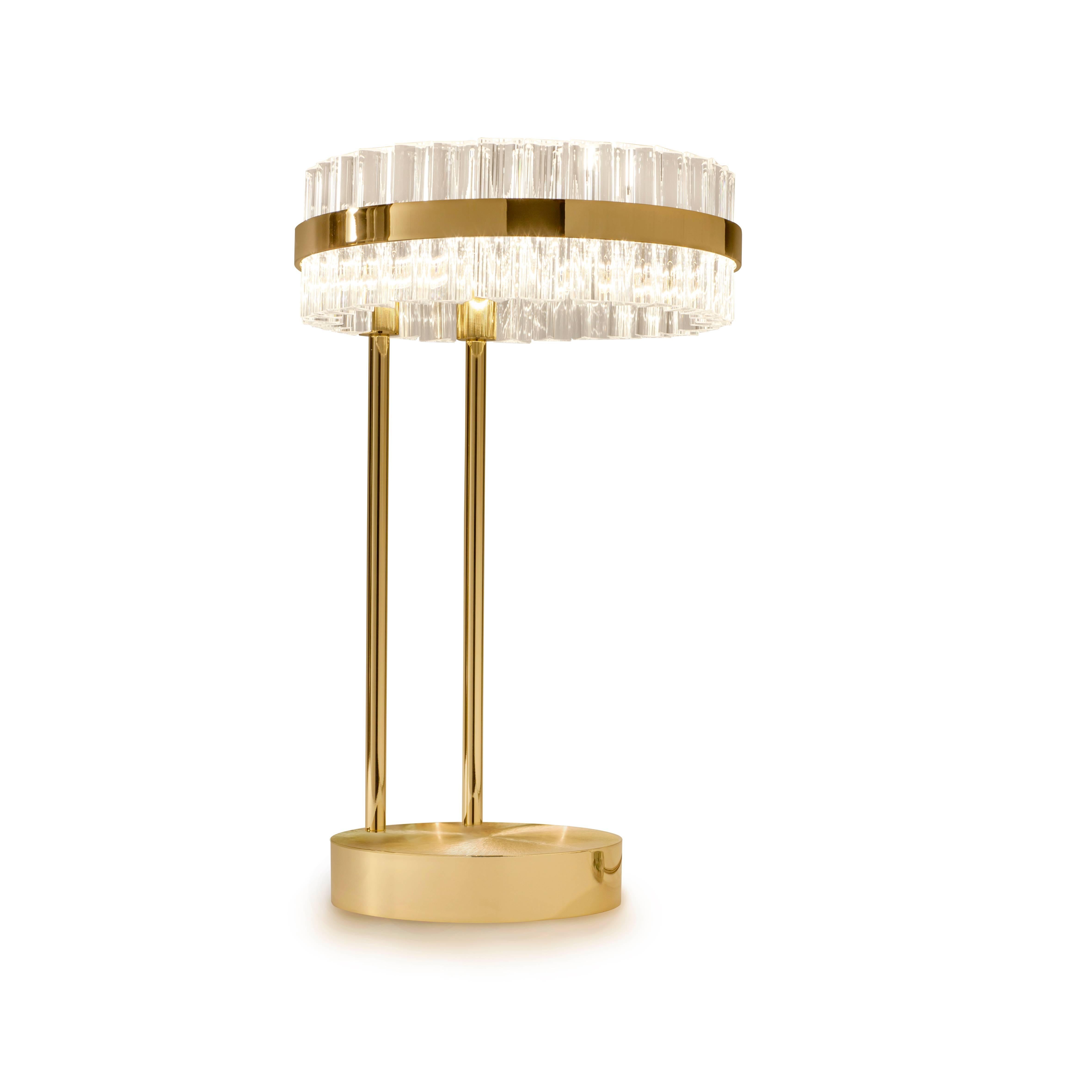 Saturno is inspired by the Constructivist’s use of geometric shapes. It draws on the simplicity and economy of using graphic lines and planes to organize or ‘construct’ the finished work.

The Saturno Table Lamp’s frame of polished gold encircles