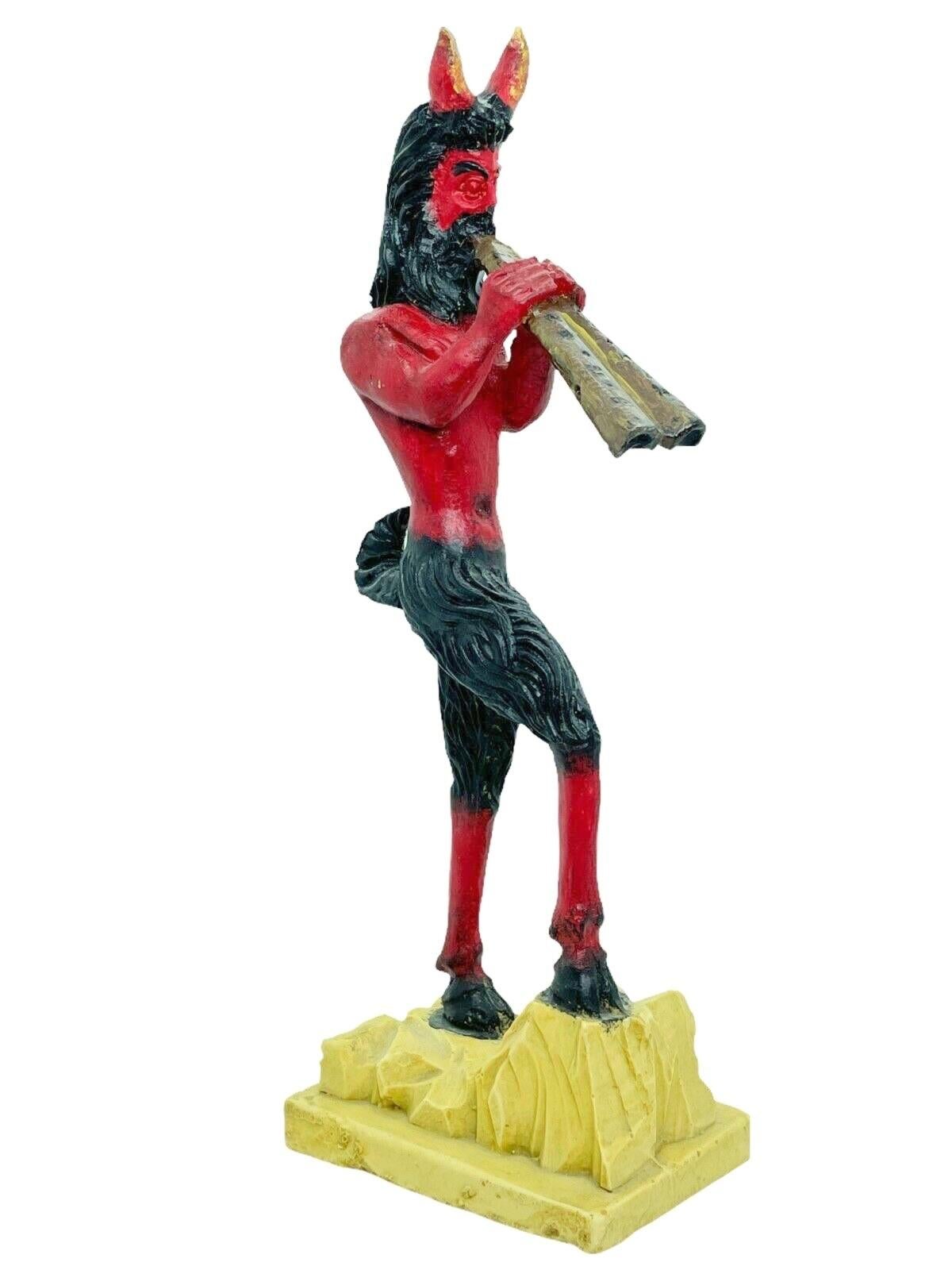 This unique Christmas figure from Austria features a handmade figurine of the Christmas character Krampus, Belsnickel's companion. The vintage piece dates from the 1960s or older and features intricate handwork and an vintage finish. Given the