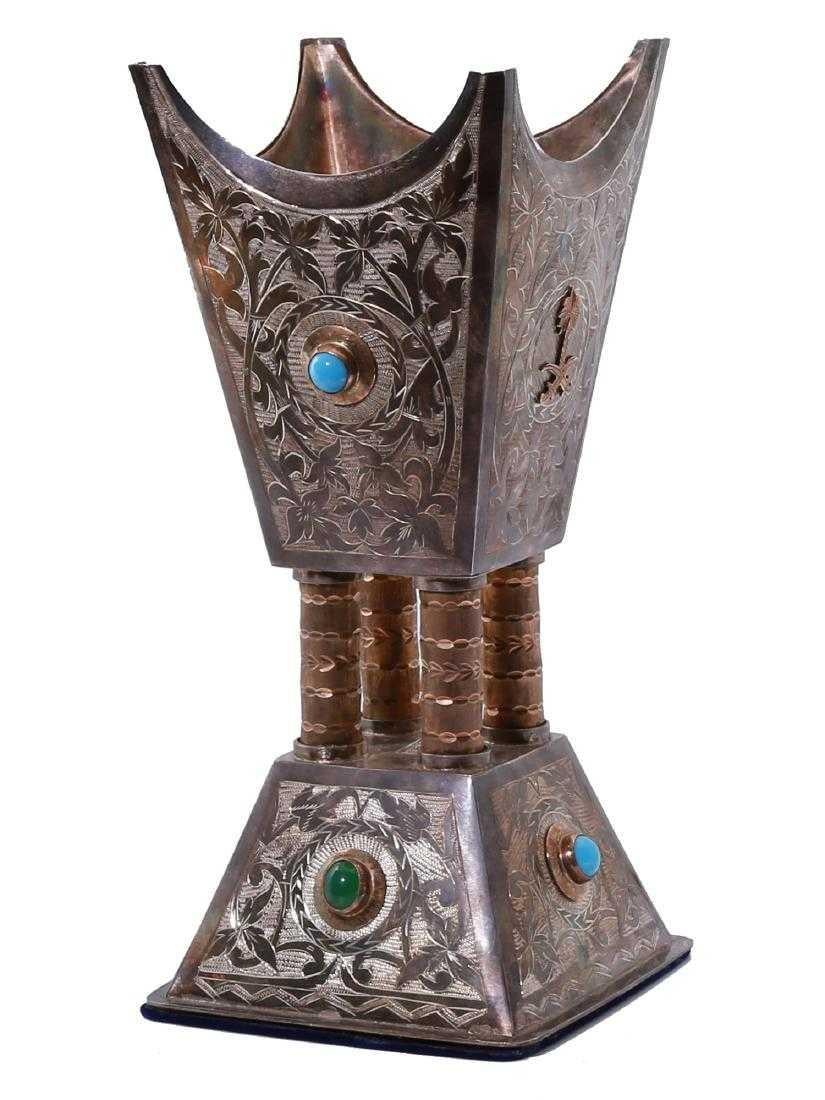 Saudi Arabian silver and gold incense Bukhur burner vase with turquoise and royal coat of arms.

Measures: 9