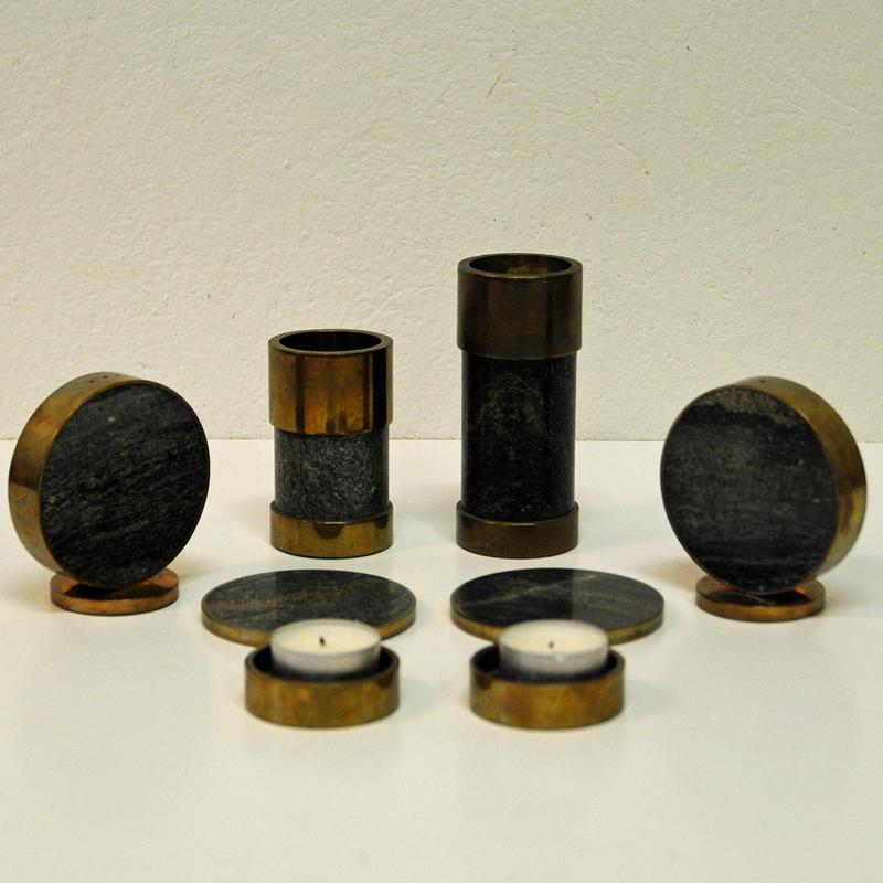 Set of total 8 items consisting of two cylinder shaped and two small tea light holders, salt & pepper holders and two stone plates for the candlelights or the holders.  This beautiful selection was made by Saulo AS in Sulitjelma, Norway. A Norwegian