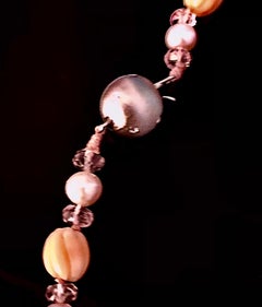 Sautoir w/ pink coral, morganite rondelles and white gold ball clasp w/ diamonds
