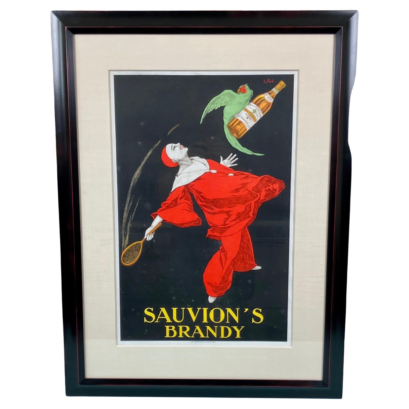 An amusing French advertising poster by Joseph Stall (French 1874-1933) for Sauvion's Brandy depicting a flying clown, a parrot and a bottle of the brandy against a black background. This original vintage poster was published in 1925. Framed and