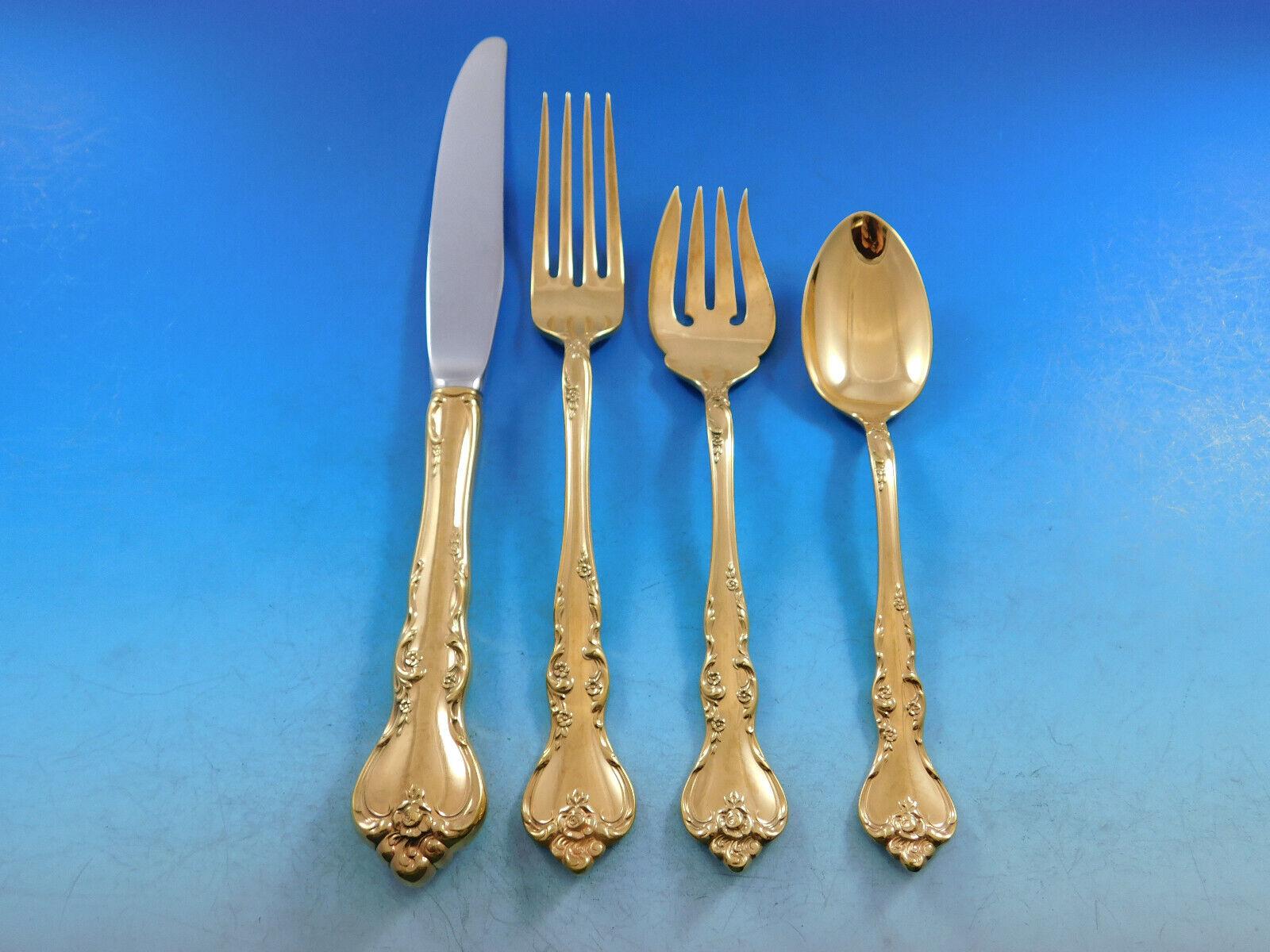 Fabulous Golden Savannah by Reed & Barton sterling silver flatware set - 60 pieces. This pattern is elegant and timeless. The pieces are vermeil - completely gold washed over sterling silver. This set includes:

12 Knives w/stainless blades, 9