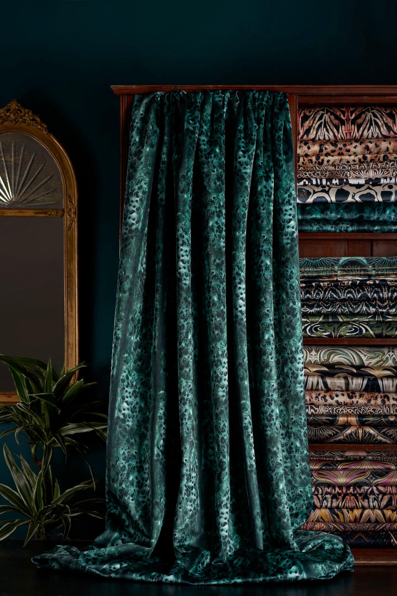 A beautiful animal-inspired print hand painted by Anna Hayman. With an artsy, linear feel this velvet has the power of animal print coupled with a softer painterly aspect. Reimagined in shades of teal and black, this is a beautiful deep green blue