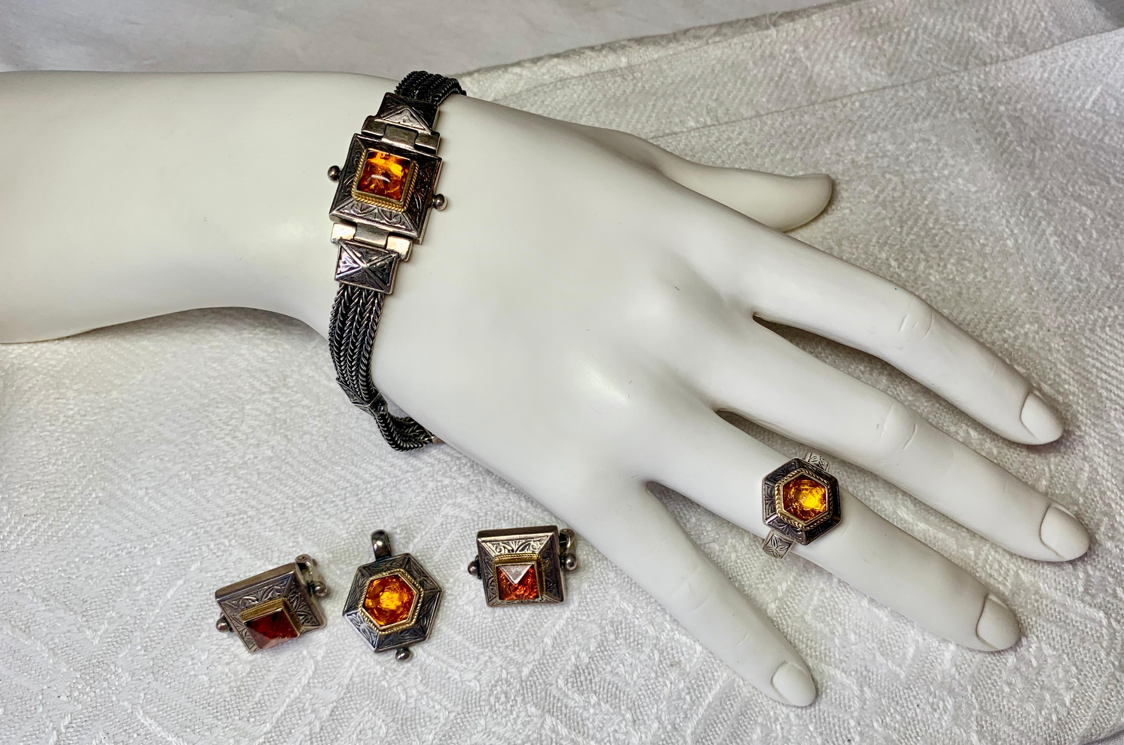 From the esteemed Greek Designer SAVATI, we have a stunning and rare Amber, 22 Karat Gold, Sterling Silver suite of jewels comprised of Bracelet, Earrings, Ring and Pendant in the Byzantine style.  SAVATI is renowned for their Byzantine inspired