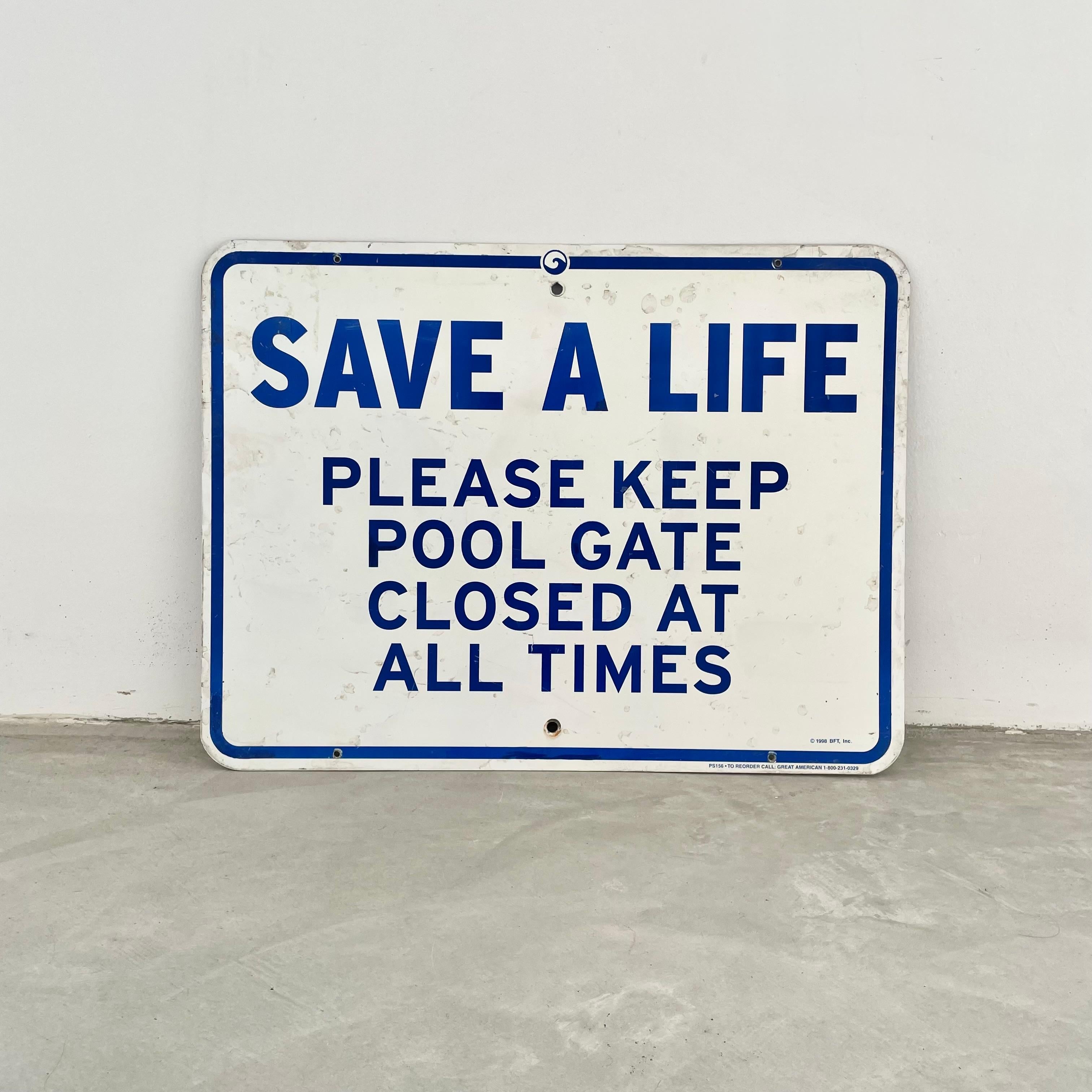 Vintage pool sign that reads 