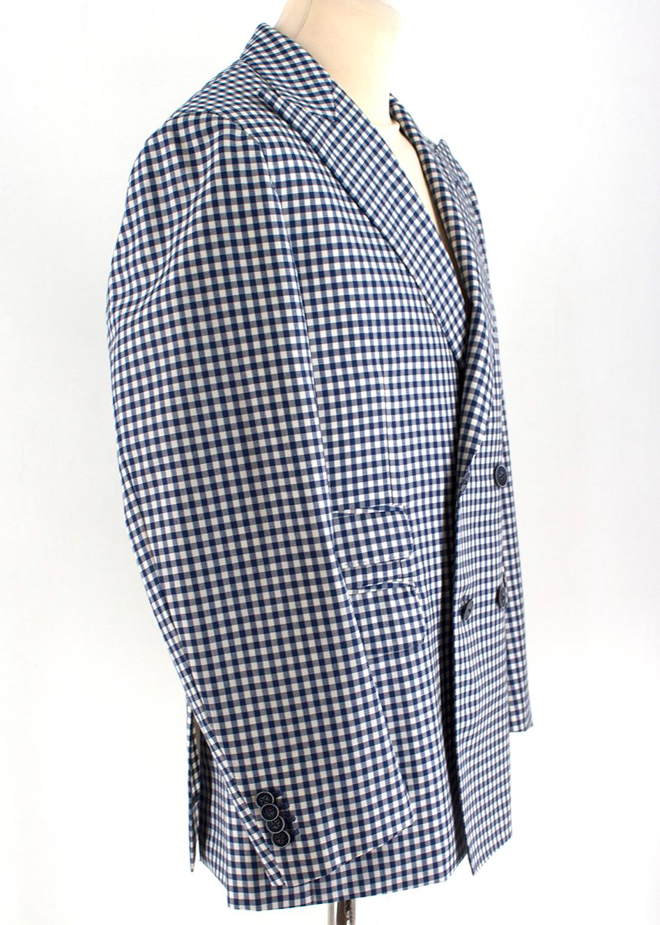 Savile Clifford Bespoke Checkered Blazer Jacket

- Navy and White Blazer Jacket
- Checkered Knit 
- Point collar, long sleeved 
- Double breasted
- Triple flap pockets, single chest slip pocket 
- Buttoned sleeves
- Partially Lined

Please note,