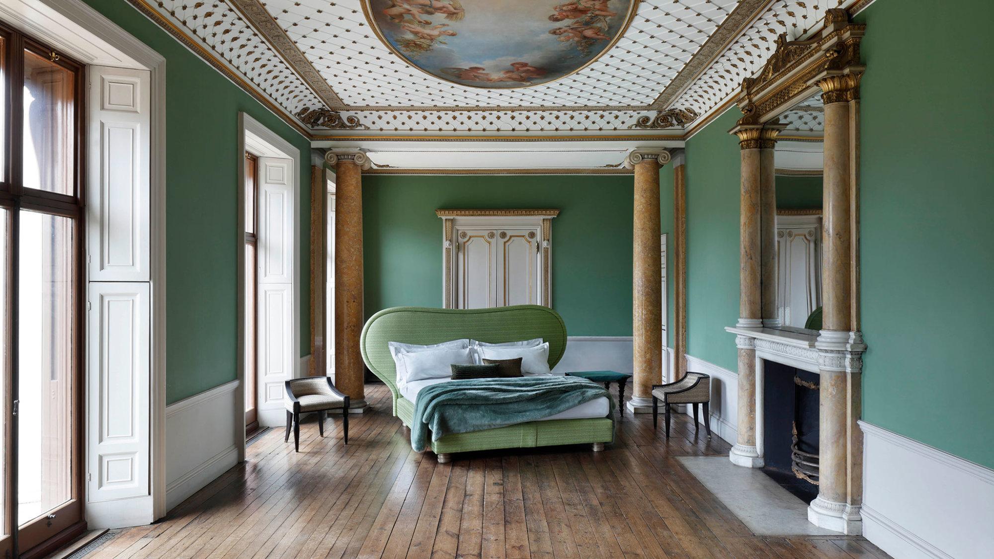 Globally renowned interior designer, Francis Sultana showcases his unique aesthetic with the creation of the Louis bed. Inspired by Elizabethan ruffs and collars, the Louis boasts curved, winged edges. A bespoke green tweed fabric and specially made