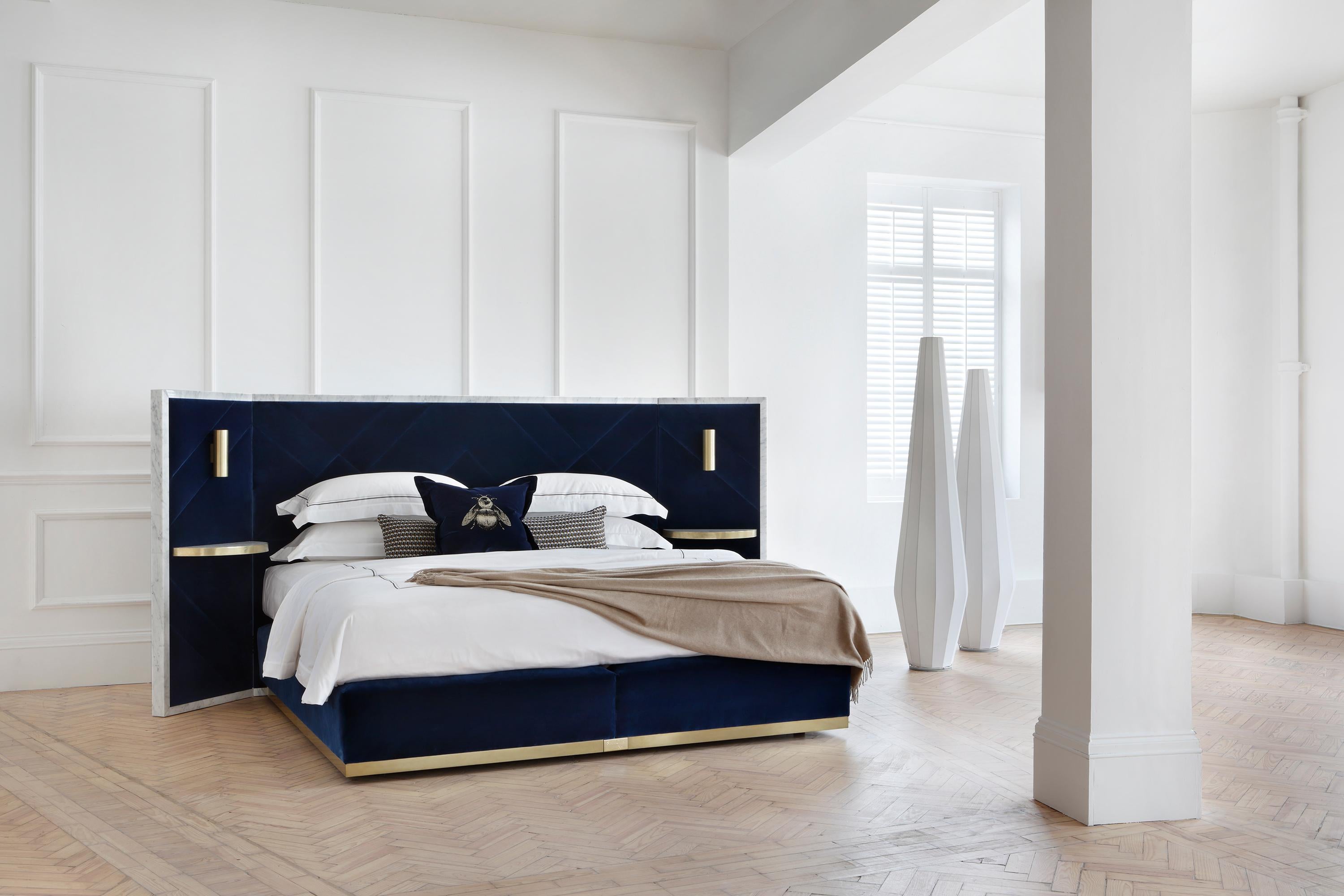 Incorporating over 100 years' experience of crafting bespoke beds, every detail of the Rocco is carefully considered. The hand-selected Carrara marble surround and upholstered geometric panelling combine with the Savoir Nº1 bed set and HKy topper to