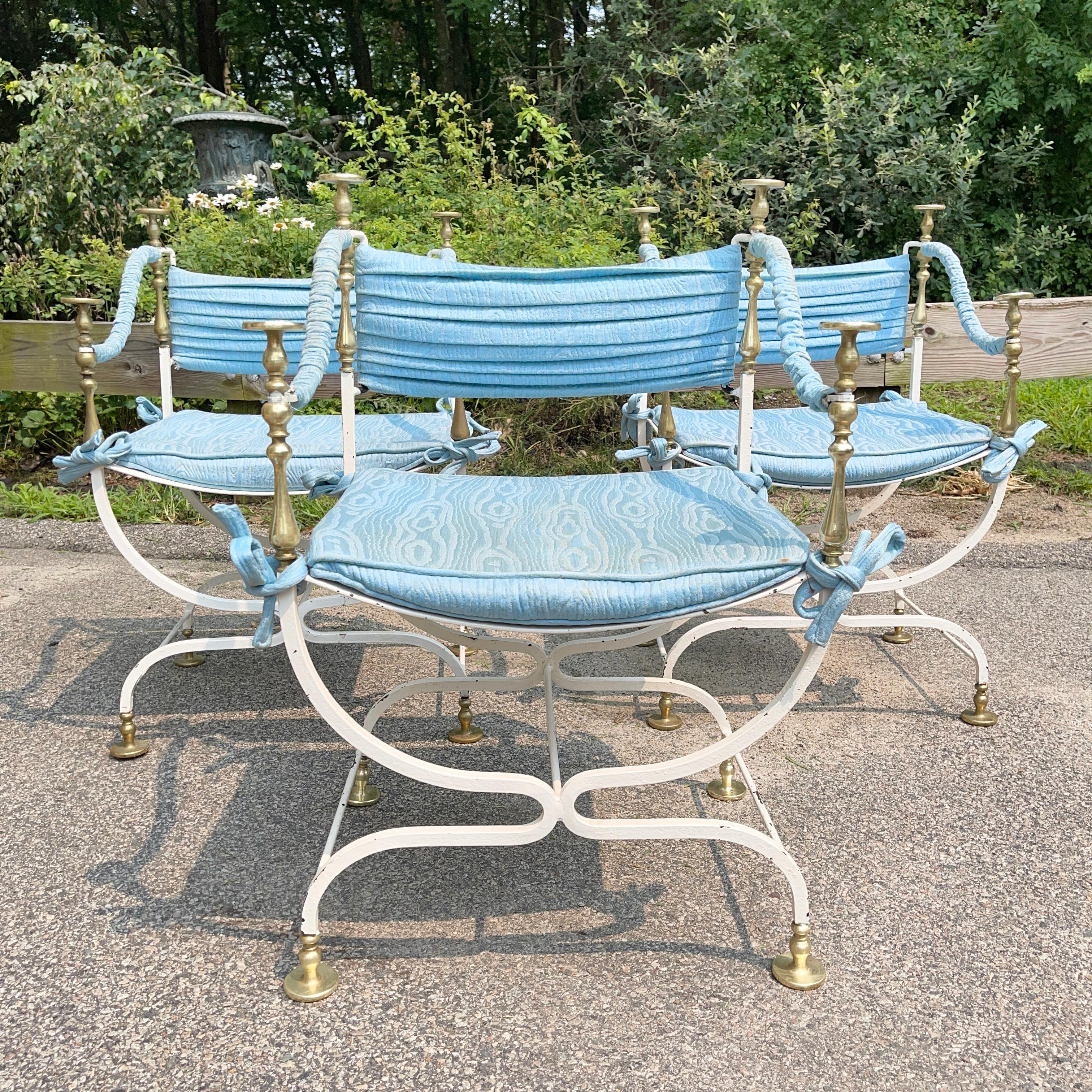 We have three matching mid-century Italian made brass and painted wrought iron Savonarola chairs.
Each chair frame is structurally sound and in its original white paint which is somewhat chippy.
Upon request we can have repainted (or powder coated)